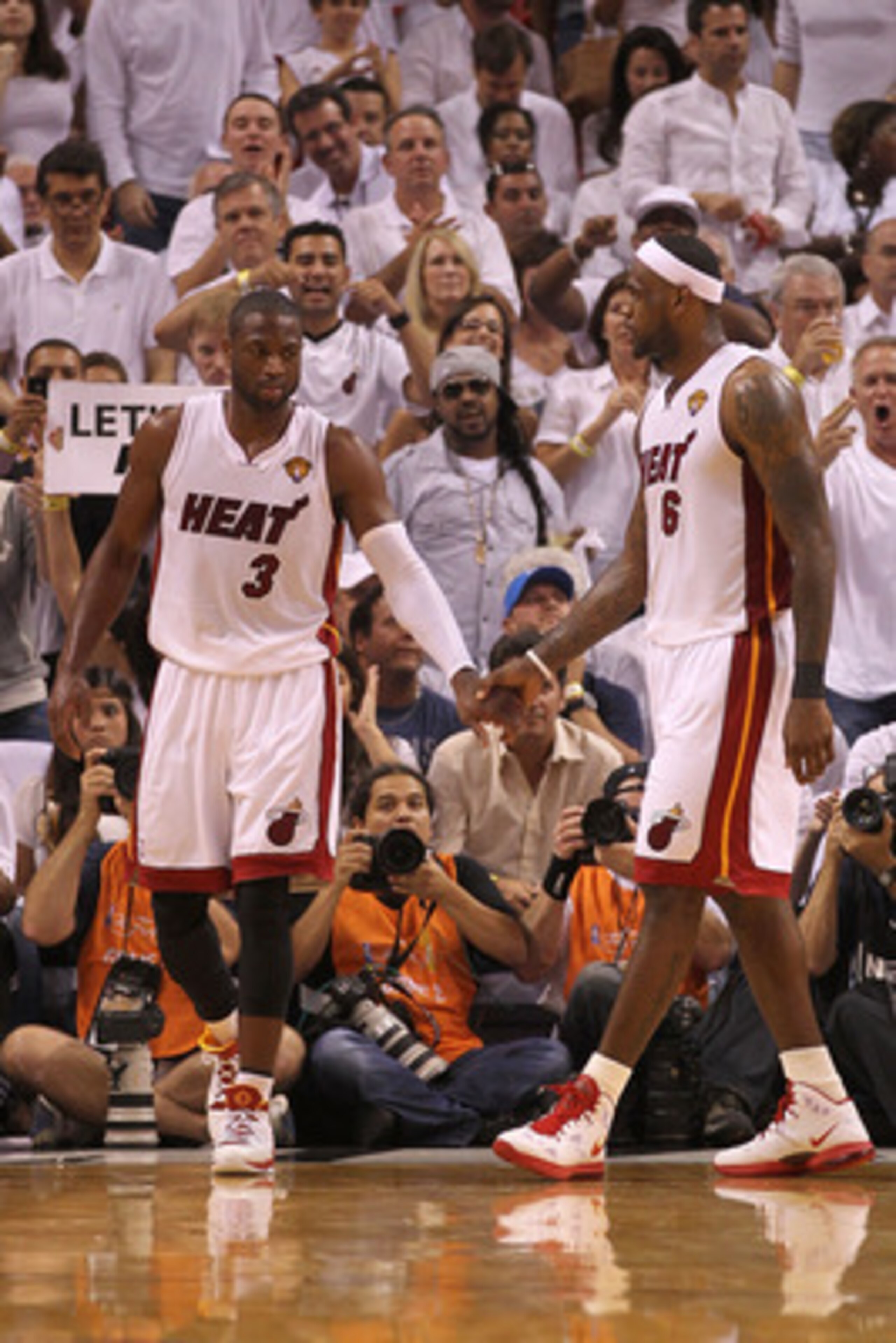 MIAMI, FL - JUNE 02:  (L-R) Dwyane Wade #3 and LeBron James #6 of the Miami Heat react after a play against the Dallas Mavericks in Game Two of the 2011 NBA Finals at American Airlines Arena on June 2, 2011 in Miami, Florida. NOTE TO USER: User expressly
