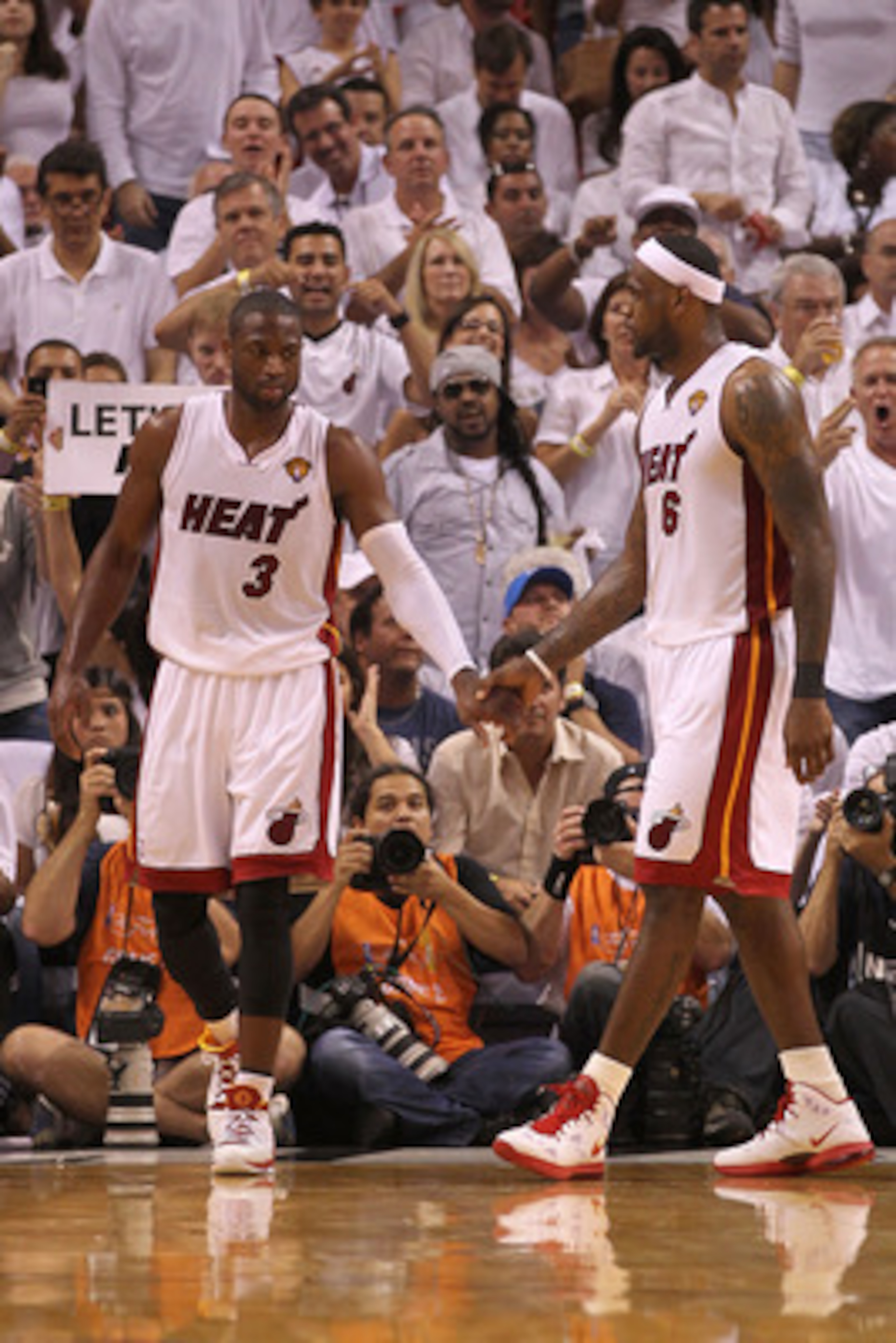 MIAMI, FL - JUNE 02: (L-R) Dwyane Wade #3 and LeBron James #6 of the Miami Heat react after a play against the Dallas Mavericks in Game Two of the 2011 NBA Finals at American Airlines Arena on June 2, 2011 in Miami, Florida. NOTE TO USER: User expressly MIAMI, FL - JUNE 02: (L-R) Dwyane Wade #3 and LeBron James #6 of the Miami Heat react after a play against the Dallas Mavericks in Game Two of the 2011 NBA Finals at American Airlines Arena on June 2, 2011 in Miami, Florida. NOTE TO USER: User expressly