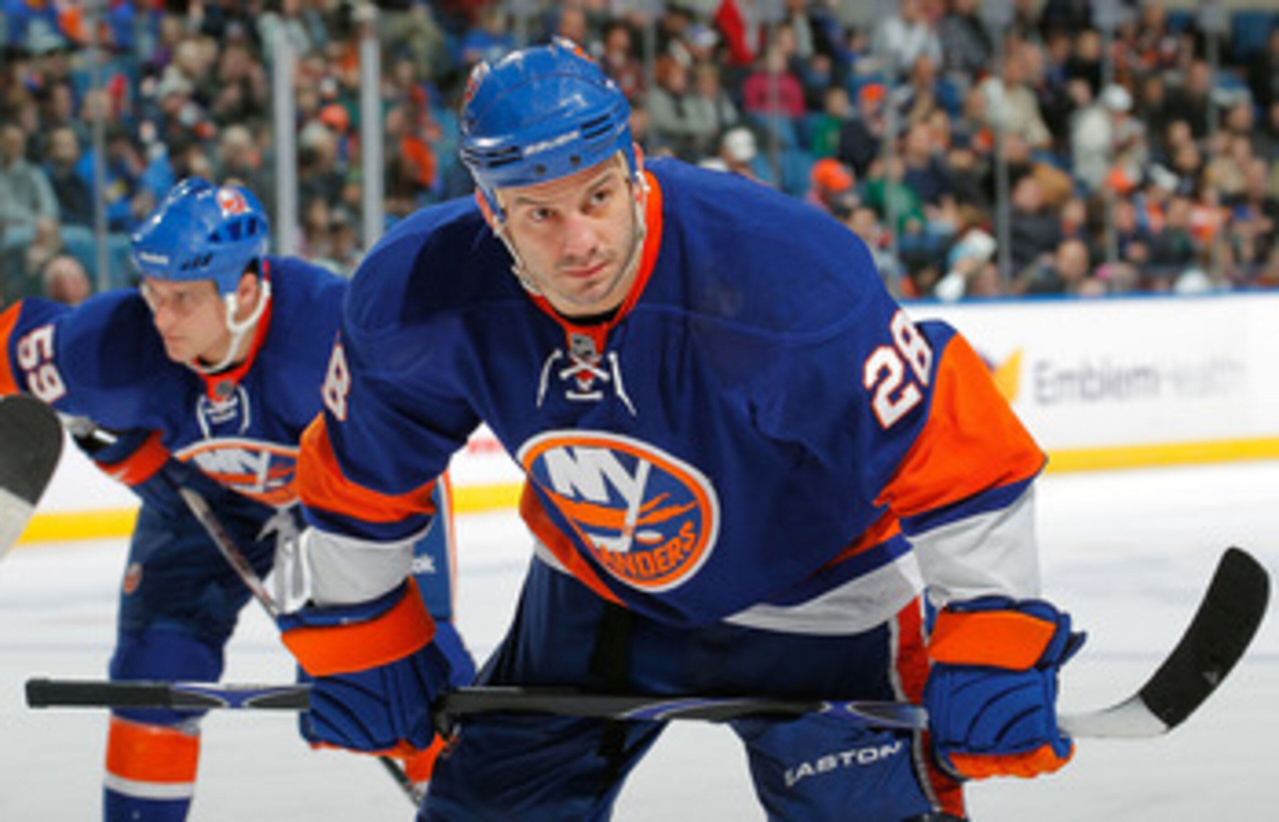 UNIONDALE, NY - FEBRUARY 21:  Zenon Konopka #28 of the New York Islanders waits for a faceoff during an NHL hockey game against the Florida Panthers at the Nassau Coliseum on February 21, 2011 in Uniondale, New York.  (Photo by Paul Bereswill/Getty Images