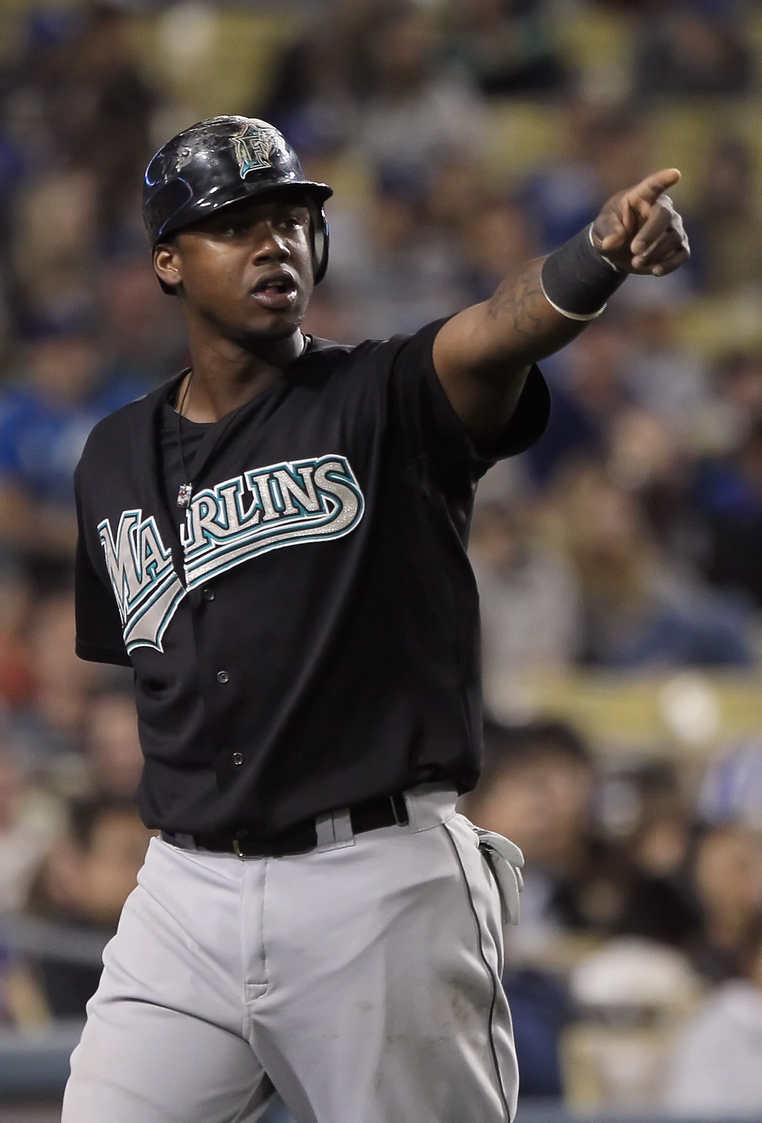 LOS ANGELES, CA - MAY 27: Hanley Ramirez #2 of the Florida Marlins acknowledges teammate Greg Dobbs (not pictured) after Dobbs drove Ramirez in with a base hit against the Los Angeles Dodgers in the eigth inning at Dodger Stadium on May 27, 2011 in Los A LOS ANGELES, CA - MAY 27: Hanley Ramirez #2 of the Florida Marlins acknowledges teammate Greg Dobbs (not pictured) after Dobbs drove Ramirez in with a base hit against the Los Angeles Dodgers in the eigth inning at Dodger Stadium on May 27, 2011 in Los A