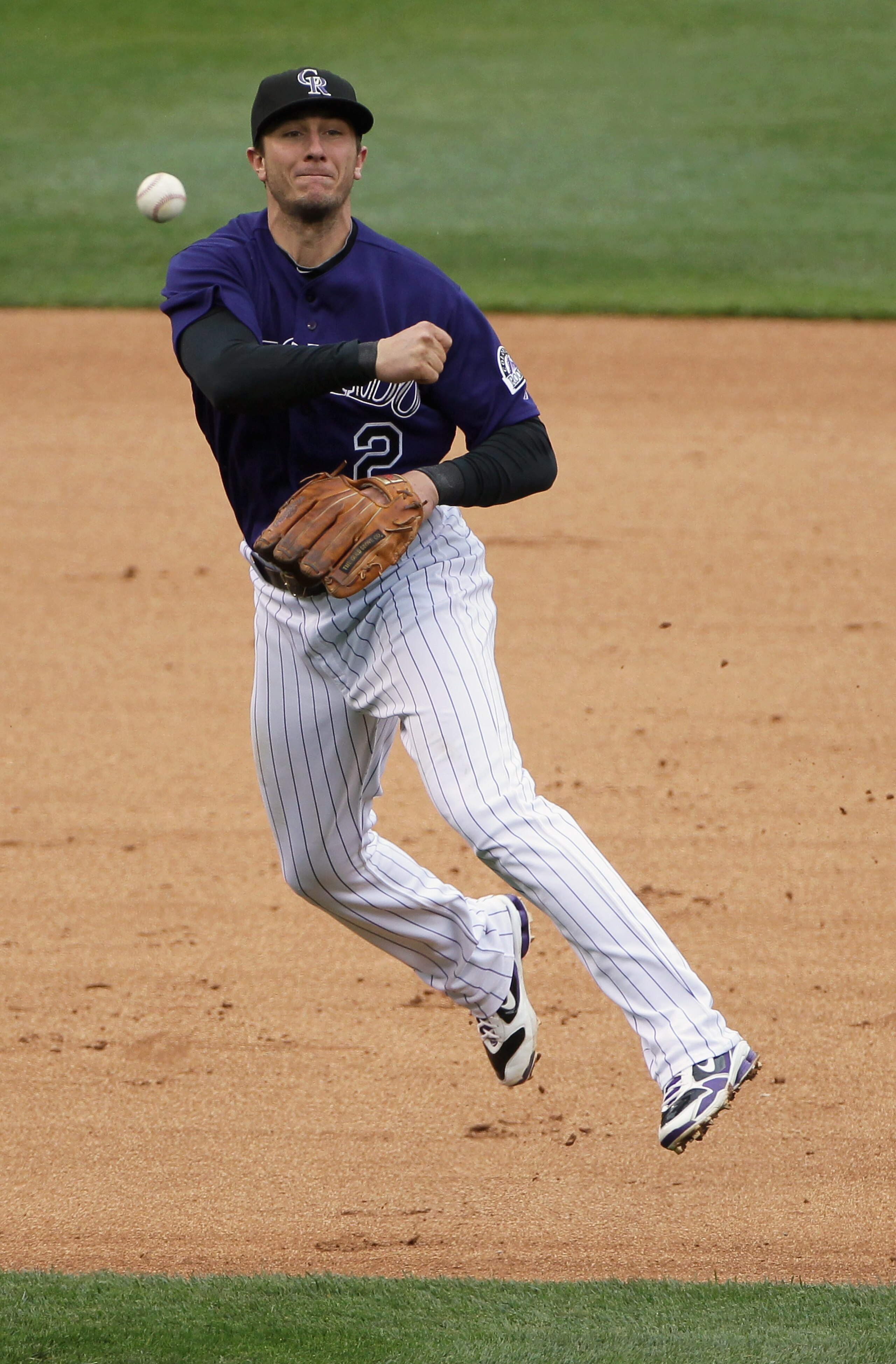 DENVER, CO - MAY 12: Shortstop Troy Tulowitzki #2 of the Colorado Rockies throws out a runner against the New York Mets at Coors Field on May 12, 2011 in Denver, Colorado. (Photo by Doug Pensinger/Getty Images) DENVER, CO - MAY 12: Shortstop Troy Tulowitzki #2 of the Colorado Rockies throws out a runner against the New York Mets at Coors Field on May 12, 2011 in Denver, Colorado. (Photo by Doug Pensinger/Getty Images)