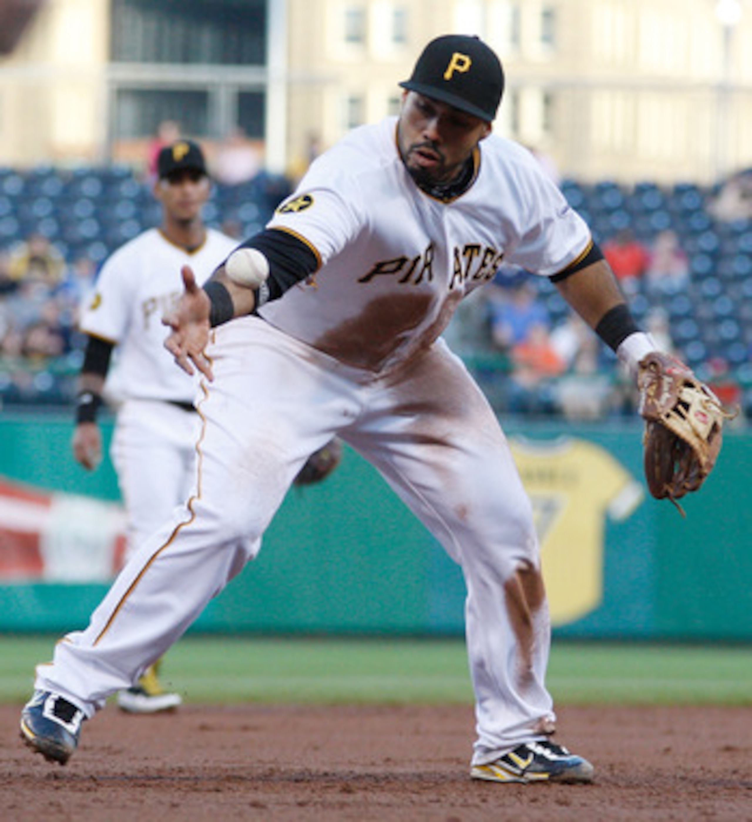 PITTSBURGH - MAY 09:  Pedro Alvarez #24 of the Pittsburgh Pirates attempts to handle the ball down the third base line during the game against the Los Angeles Dodgers on May 9, 2011 at PNC Park in Pittsburgh, Pennsylvania.  (Photo by Jared Wickerham/Getty