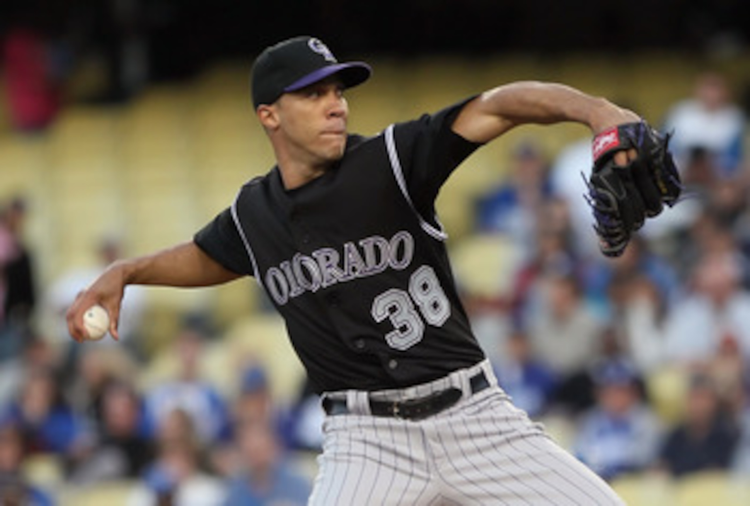 LOS ANGELES, CA - JUNE 01:  Ubaldo Jimenez #38 of the Colorado Rockies pitches against the Los Angeles Dodgers in the second inning at Dodger Stadium on June 1, 2011 in Los Angeles, California.  (Photo by Jeff Gross/Getty Images)