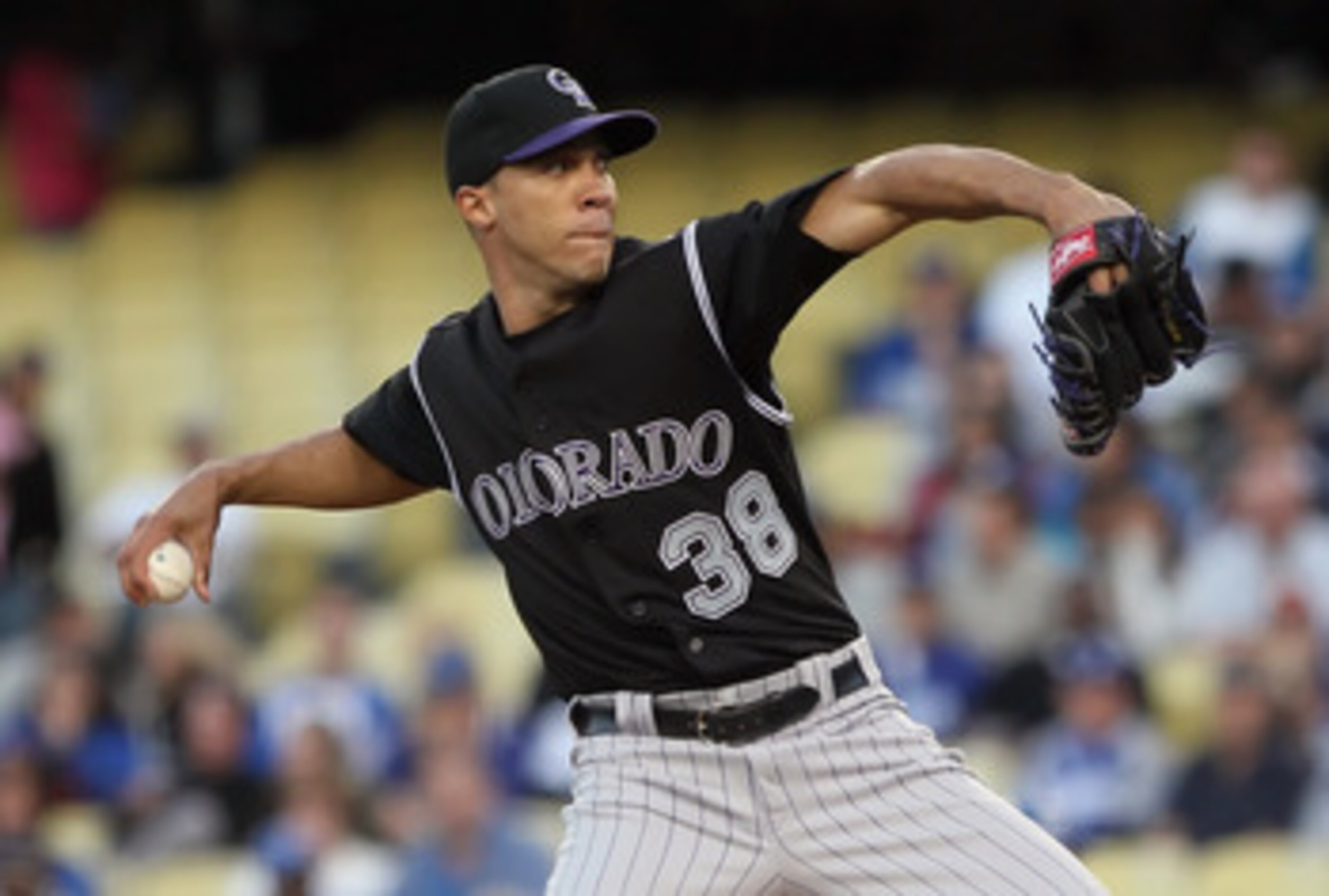 LOS ANGELES, CA - JUNE 01:  Ubaldo Jimenez #38 of the Colorado Rockies pitches against the Los Angeles Dodgers in the second inning at Dodger Stadium on June 1, 2011 in Los Angeles, California.  (Photo by Jeff Gross/Getty Images)