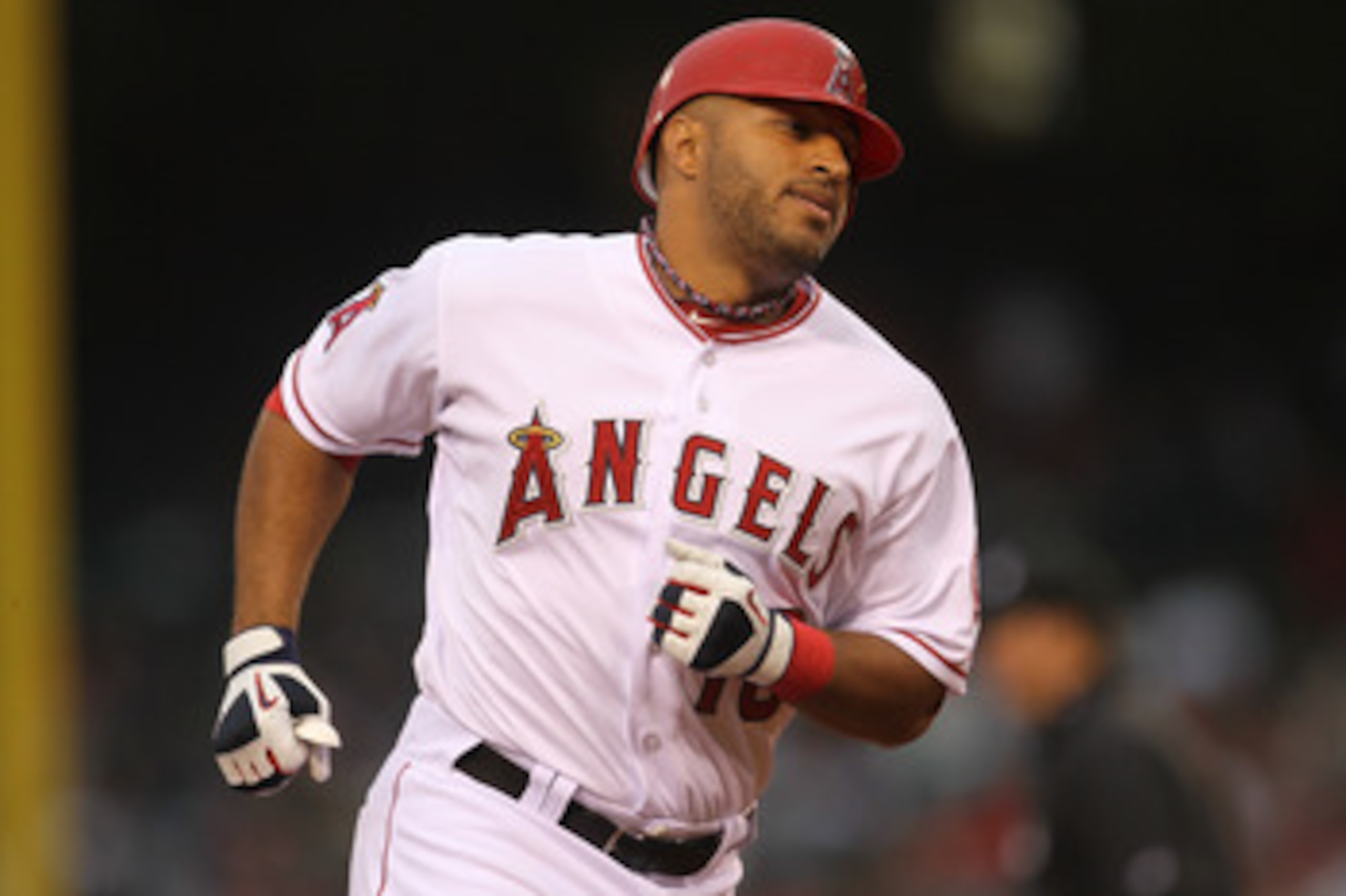 ANAHEIM, CA - MAY 07:  Vernon Wells #10 of the Los Angeles Angels of Anaheim rounds the bases after hitting his second inning two run home run against the Cleveland Indians on May 7, 2011 at Angel Stadium in Anaheim, California.  (Photo by Stephen Dunn/Ge