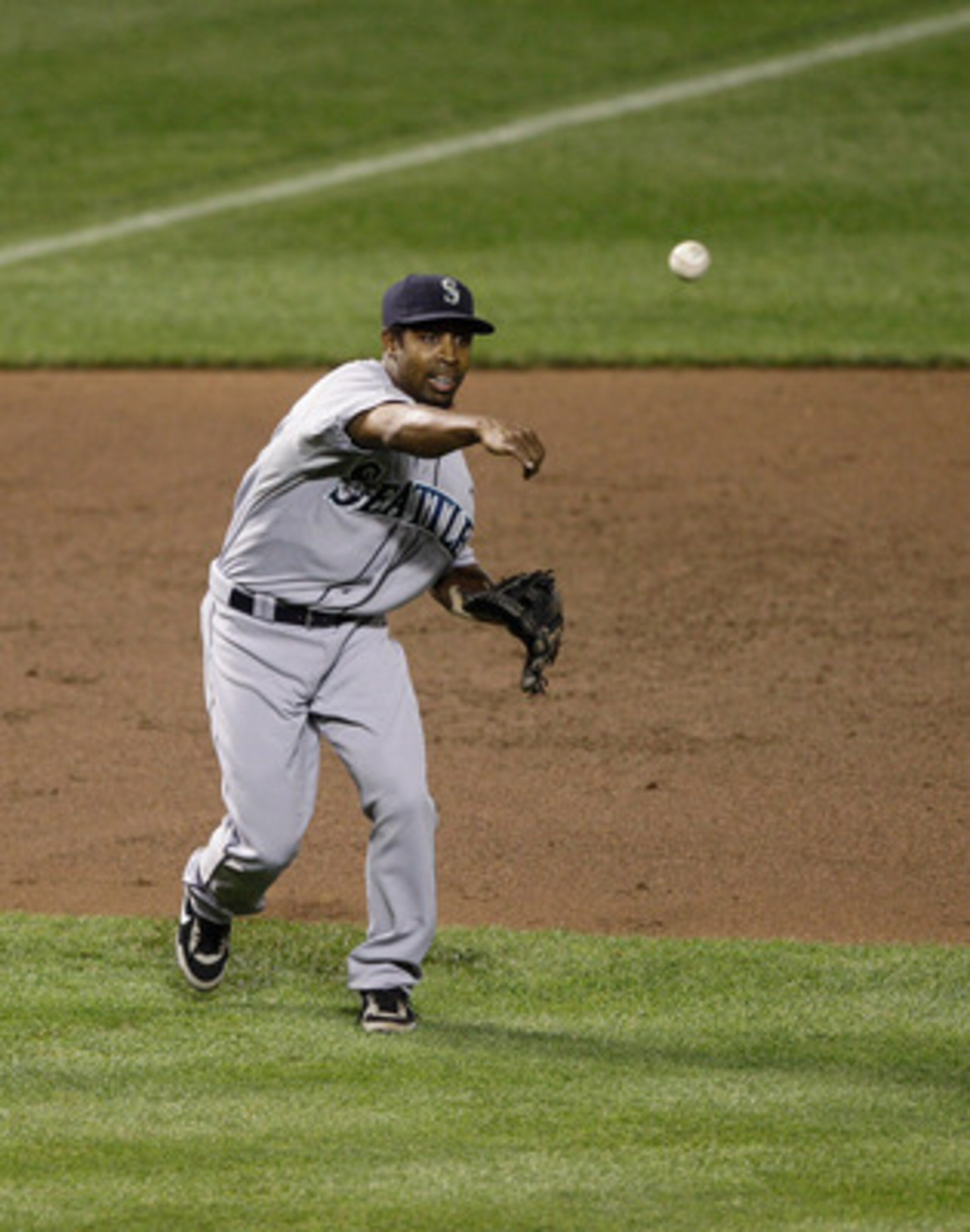 BALTIMORE, MD - MAY 12: Chone Figgins #9 of the Seattle Mariners in action against the Baltimore Orioles at Oriole Park at Camden Yards on May 12, 2011 in Baltimore, Maryland. (Photo by Rob Carr/Getty Images) BALTIMORE, MD - MAY 12: Chone Figgins #9 of the Seattle Mariners in action against the Baltimore Orioles at Oriole Park at Camden Yards on May 12, 2011 in Baltimore, Maryland. (Photo by Rob Carr/Getty Images)