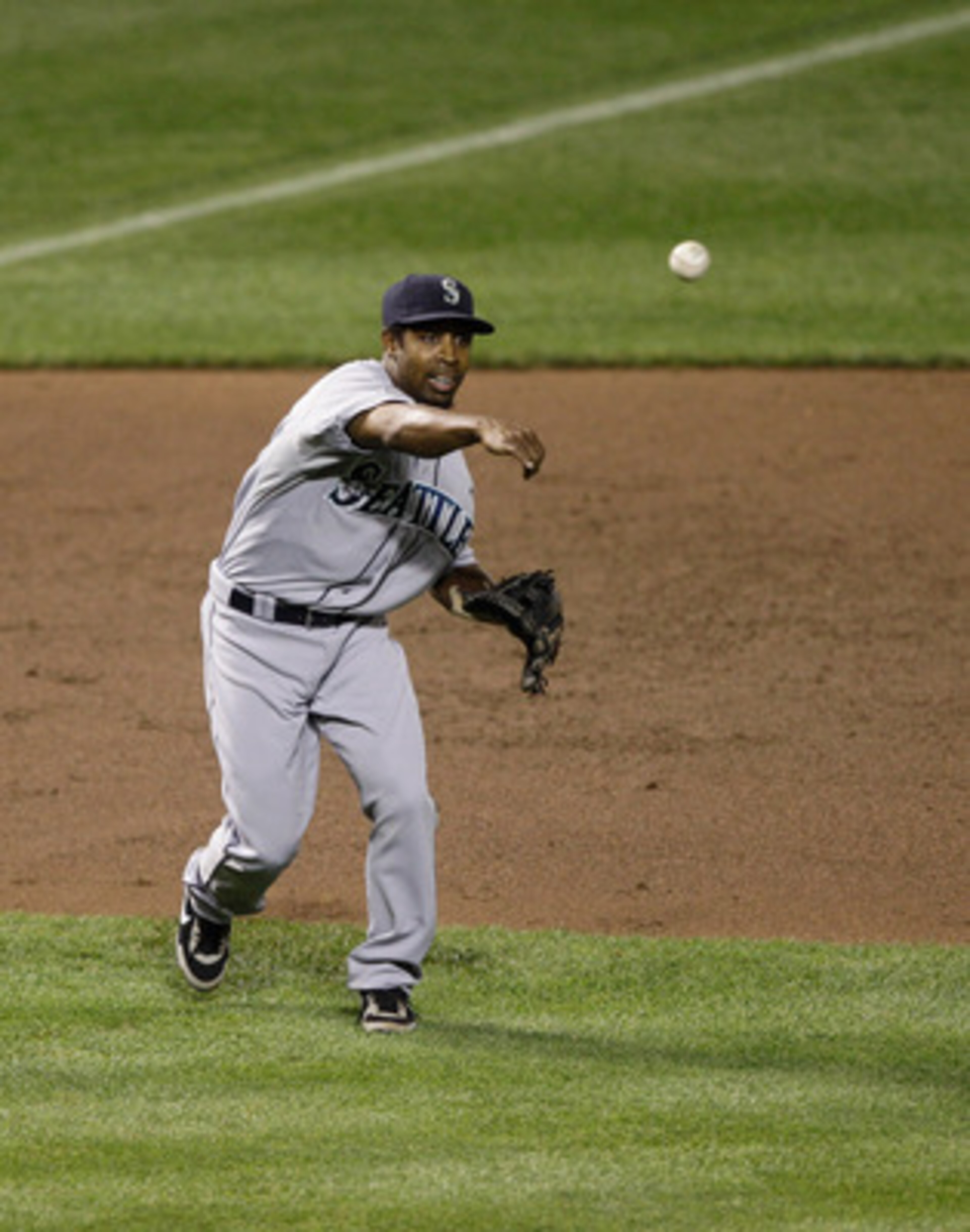 BALTIMORE, MD - MAY 12:  Chone Figgins #9 of the Seattle Mariners in action against the Baltimore Orioles at Oriole Park at Camden Yards on May 12, 2011 in Baltimore, Maryland.  (Photo by Rob Carr/Getty Images)