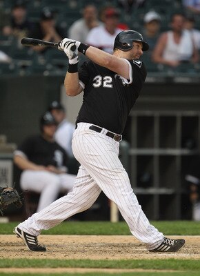 CHICAGO, IL - MAY 22: Adam Dunn #32 of the Chicago White Sox hits a run-scoring single in the 8th inning against the Los Angeles Dodgers at U.S. Cellular Field on May 22, 2011 in Chicago, Illinois. The White Sox defeated the Dodgers 8-3. (Photo by Jonatha