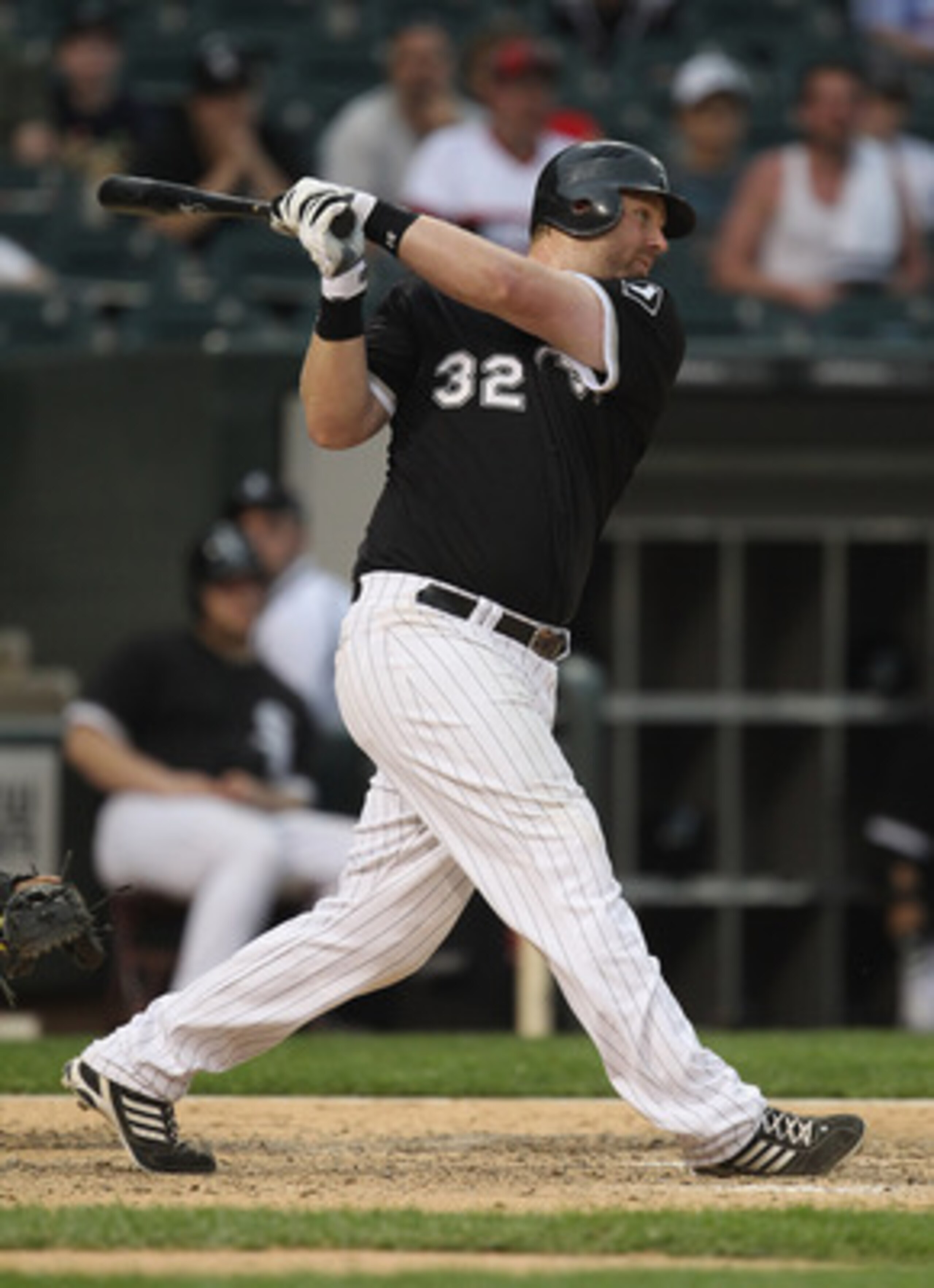 CHICAGO, IL - MAY 22: Adam Dunn #32 of the Chicago White Sox hits a run-scoring single in the 8th inning against the Los Angeles Dodgers at U.S. Cellular Field on May 22, 2011 in Chicago, Illinois. The White Sox defeated the Dodgers 8-3. (Photo by Jonatha