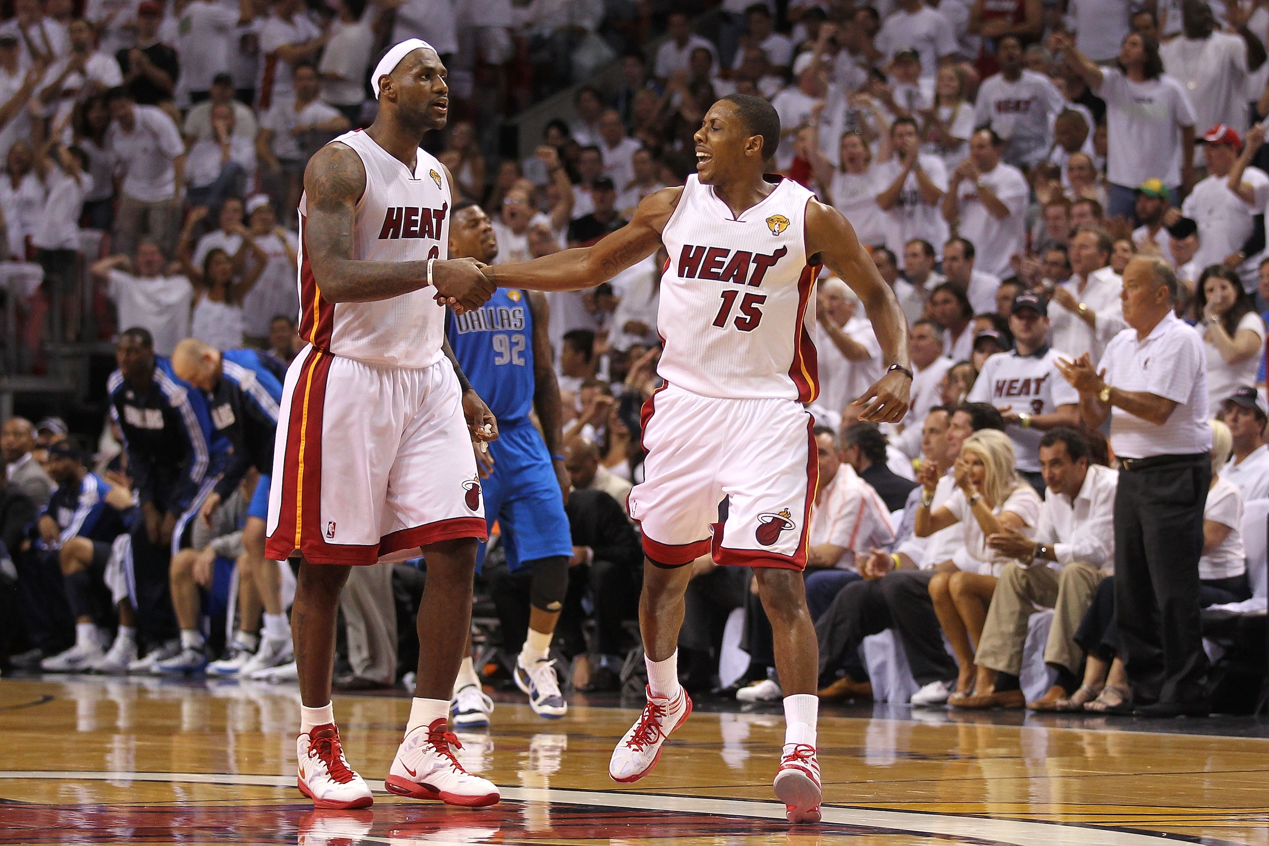 MIAMI, FL - JUNE 02:  (L-R) LeBron James #6 and Mario Chalmers #15 of the Miami Heat celebrate a play against the Dallas Mavericks in Game Two of the 2011 NBA Finals at American Airlines Arena on June 2, 2011 in Miami, Florida. NOTE TO USER: User expressl