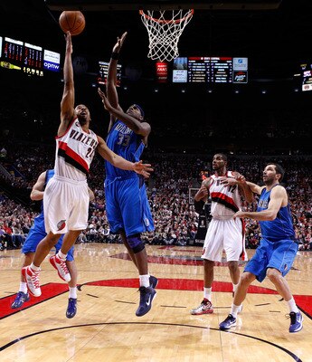 PORTLAND, OR - APRIL 21:  Andre Miller #24 of the Portland Trail Blazers shoots the ball against Brendan Haywood #33 of the Dallas Mavericks in Game Three of the Western Conference Quarterfinals in the 2011 NBA Playoffs on April 21, 2011 at the Rose Garde