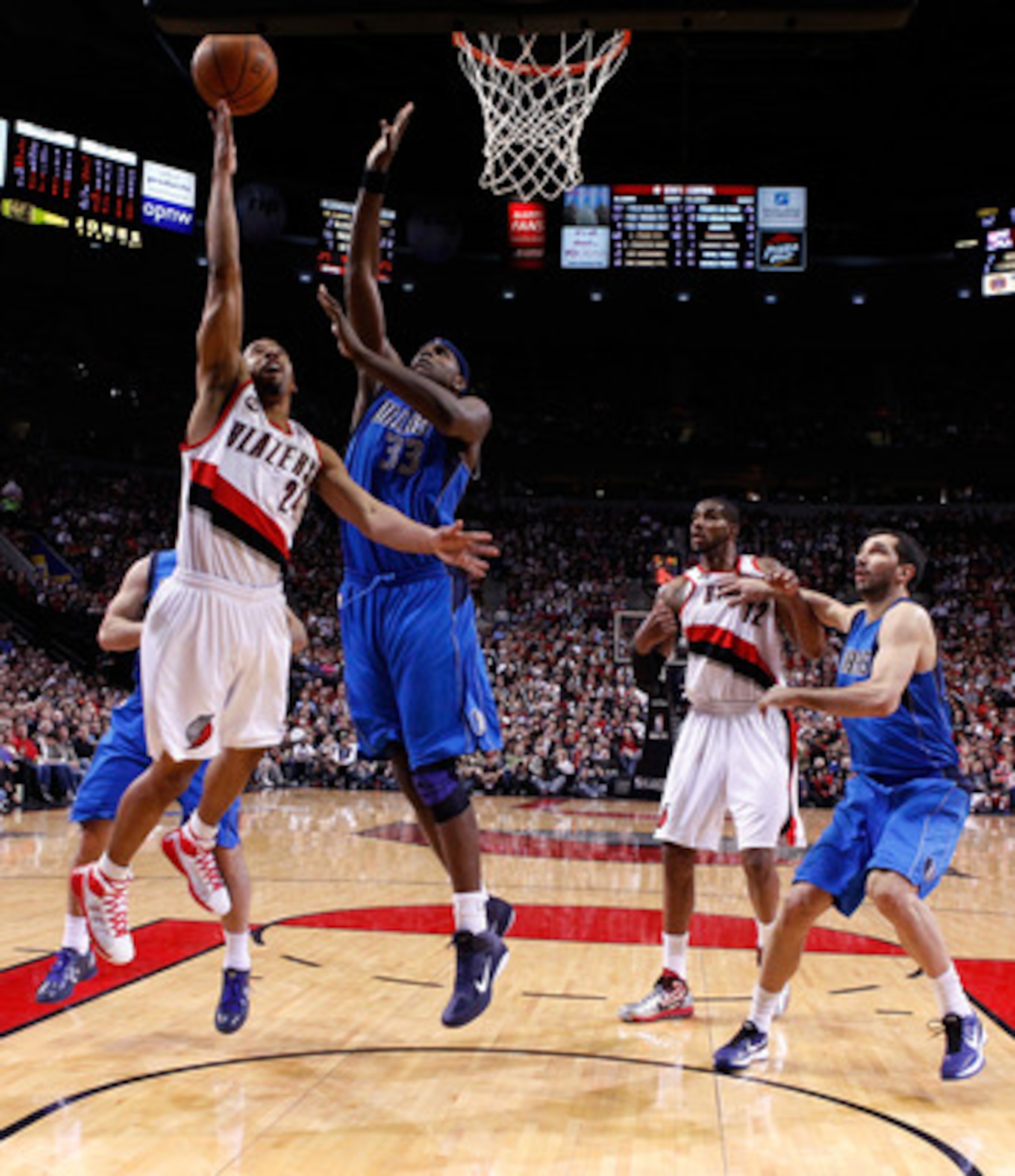 PORTLAND, OR - APRIL 21:  Andre Miller #24 of the Portland Trail Blazers shoots the ball against Brendan Haywood #33 of the Dallas Mavericks in Game Three of the Western Conference Quarterfinals in the 2011 NBA Playoffs on April 21, 2011 at the Rose Garde