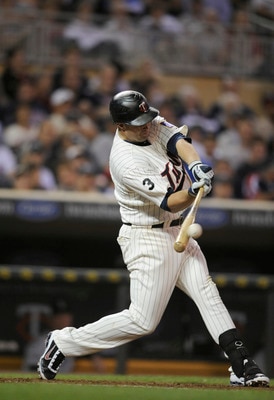 MINNEAPOLIS, MN - MAY 23: Michael Cuddyer #5 of the Minnesota Twins bats against the Seattle Mariners during their game on May 23, 2011 at Target Field in Minneapolis, Minnesota. The Rockies won 6-5. (Photo by Hannah Foslien/Getty Images)