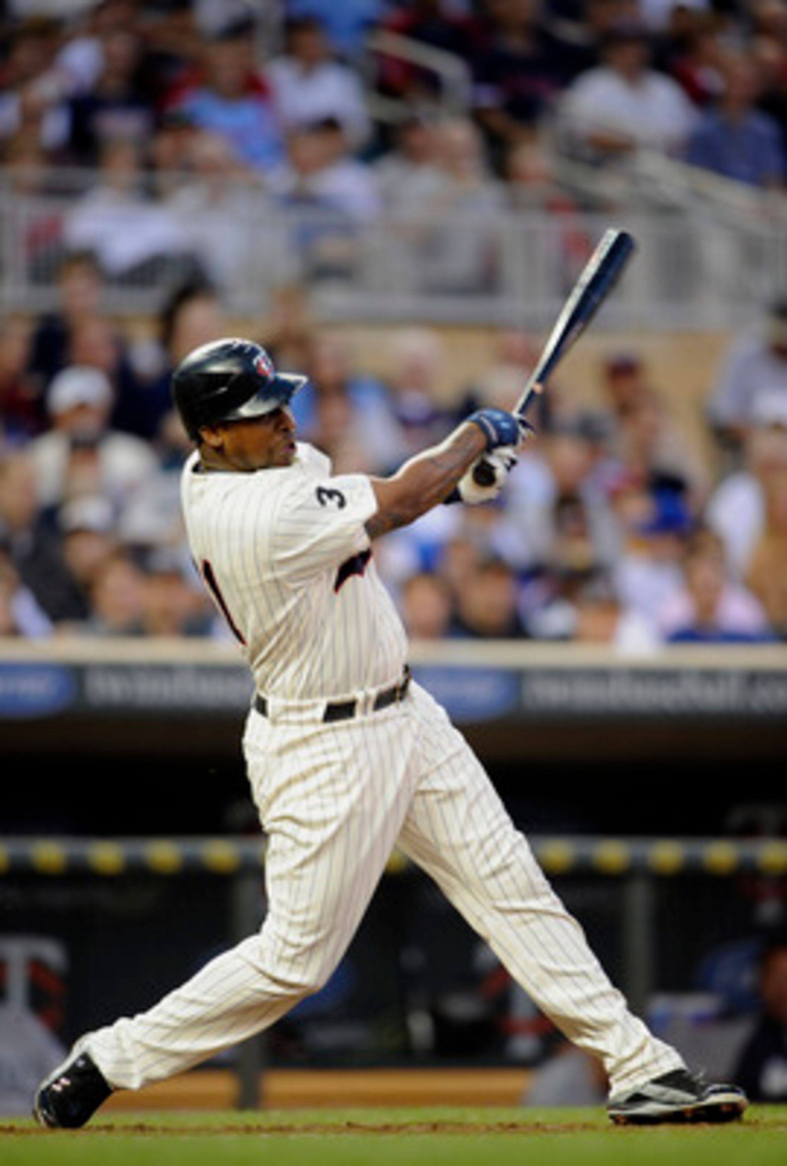 MINNEAPOLIS, MN - MAY 23: Delmon Young #21 of the Minnesota Twins bats against the Seattle Mariners during their game on May 23, 2011 at Target Field in Minneapolis, Minnesota. The Rockies won 6-5. (Photo by Hannah Foslien/Getty Images)