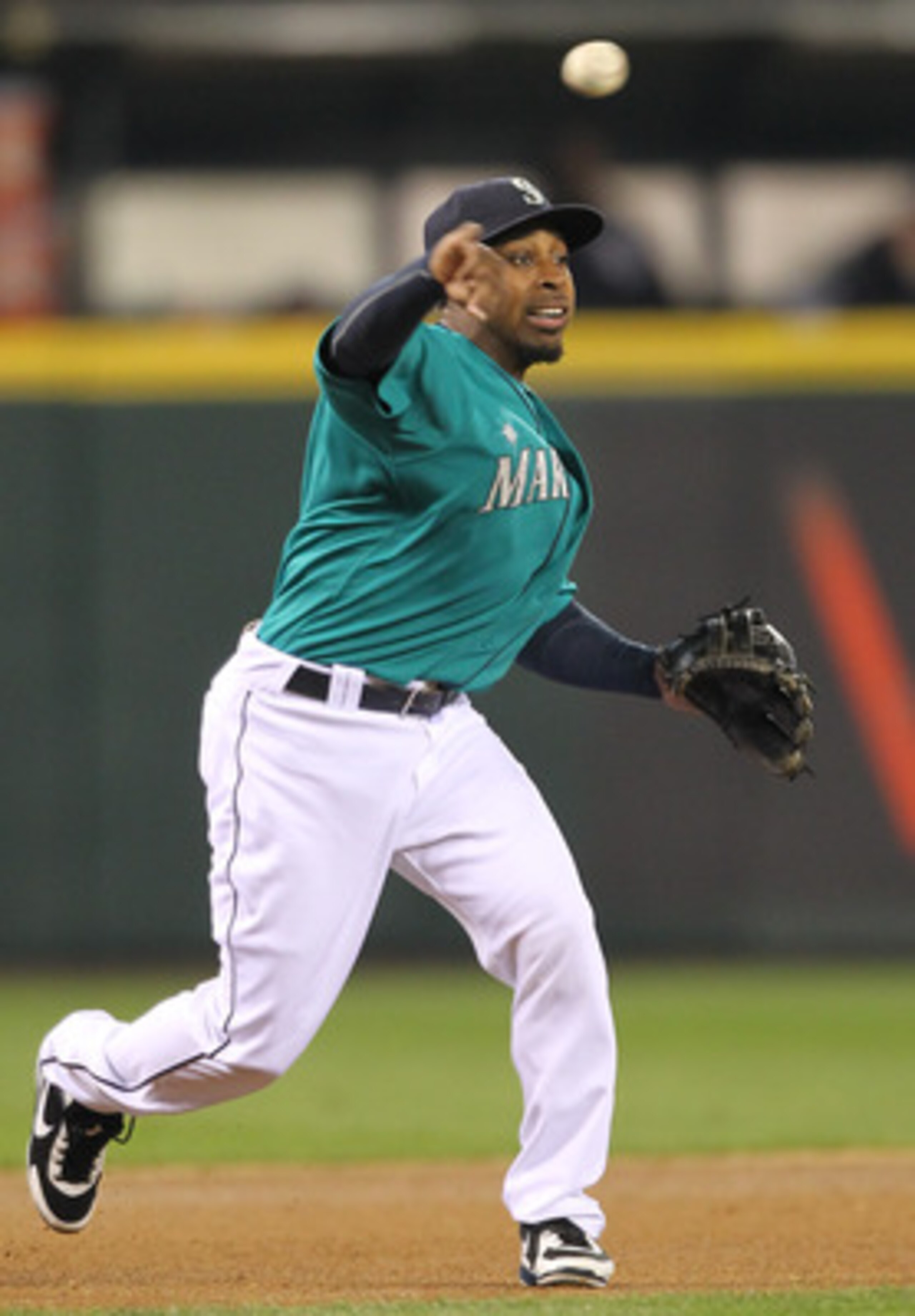 SEATTLE - MAY 06: Chone Figgins #9 of the Seattle Mariners throws to first against the Chicago White Sox at Safeco Field on May 6, 2011 in Seattle, Washington. The Mariners won 3-2. (Photo by Otto Greule Jr/Getty Images) SEATTLE - MAY 06: Chone Figgins #9 of the Seattle Mariners throws to first against the Chicago White Sox at Safeco Field on May 6, 2011 in Seattle, Washington. The Mariners won 3-2. (Photo by Otto Greule Jr/Getty Images)