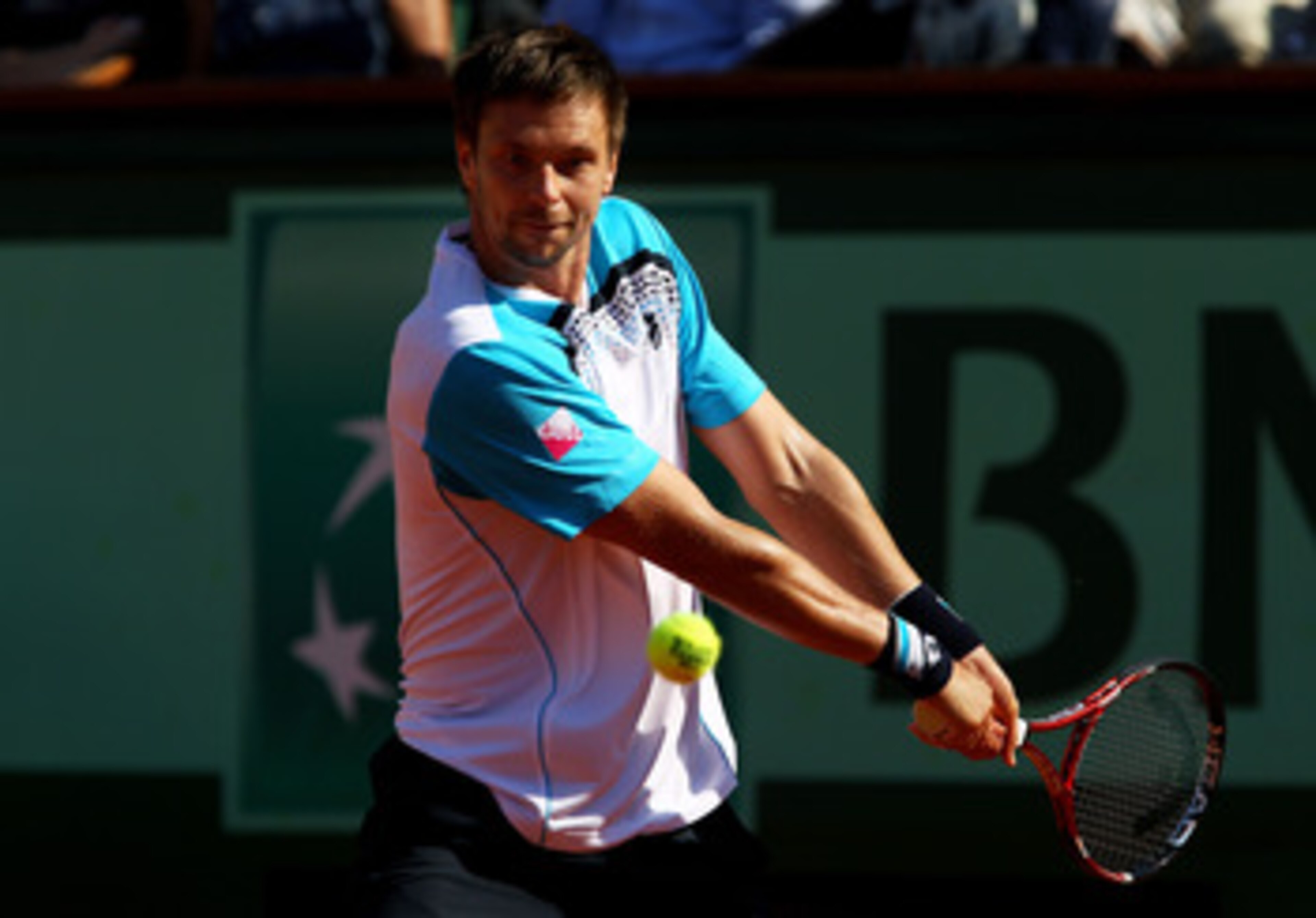 PARIS, FRANCE - JUNE 01: Robin Soderling of Sweden hits a backhand during the men's singles quarterfinal match between Rafael Nadal of Spain and Robin Soderling of Sweden on day eleven of the French Open at Roland Garros on June 1, 2011 in Paris, France. PARIS, FRANCE - JUNE 01: Robin Soderling of Sweden hits a backhand during the men's singles quarterfinal match between Rafael Nadal of Spain and Robin Soderling of Sweden on day eleven of the French Open at Roland Garros on June 1, 2011 in Paris, France.