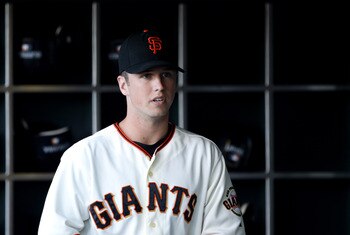 SAN FRANCISCO - JULY 15:  Buster Posey #28 of the San Francisco Giants stands in the dugout before their game against the New York Mets at AT&T Park on July 15, 2010 in San Francisco, California.  (Photo by Ezra Shaw/Getty Images)
