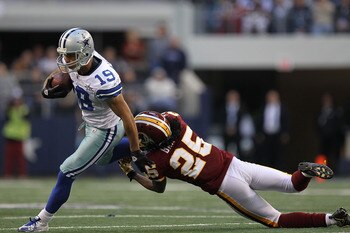 ARLINGTON, TX - DECEMBER 19: Wide receiver Miles Austin #19 of the Dallas Cowboys runs the ball against Kevin Barnes #25 of the Washington Redskins at Cowboys Stadium on December 19, 2010 in Arlington, Texas. (Photo by Ronald Martinez/Getty Images) ARLINGTON, TX - DECEMBER 19: Wide receiver Miles Austin #19 of the Dallas Cowboys runs the ball against Kevin Barnes #25 of the Washington Redskins at Cowboys Stadium on December 19, 2010 in Arlington, Texas. (Photo by Ronald Martinez/Getty Images)