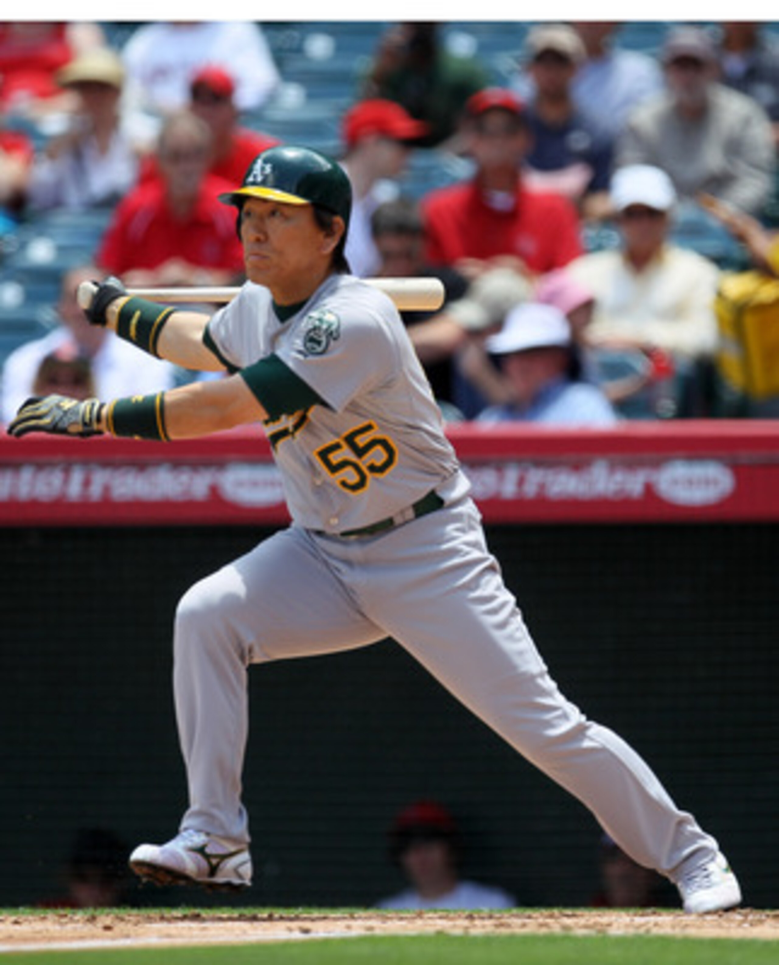 ANAHEIM, CA - MAY 26: Hideki Matsui #55 of the Oakland Athletics hits a single to lead off the second inning against the Los Angeles Angels of Anaheim on May 26, 2011 at Angel Stadium in Anaheim, California. Matsui went on to score a run in the inning.  (