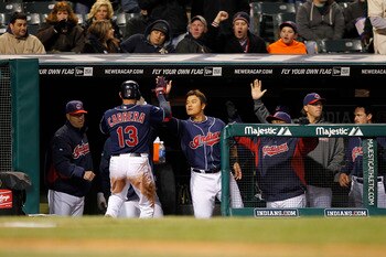 CLEVELAND - APRIL 05:  Asdrubal Cabrera #13 of the Cleveland Indians celebrates afer scoring during the fifth inning of the game against the Boston Red Sox at Progressive Field on April 5, 2011 in Cleveland, Ohio.  (Photo by Leon Halip/Getty Images)