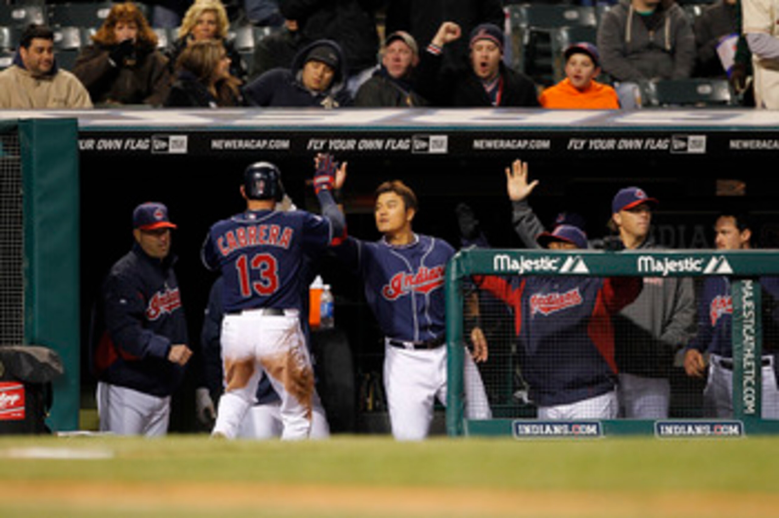 CLEVELAND - APRIL 05:  Asdrubal Cabrera #13 of the Cleveland Indians celebrates afer scoring during the fifth inning of the game against the Boston Red Sox at Progressive Field on April 5, 2011 in Cleveland, Ohio.  (Photo by Leon Halip/Getty Images)