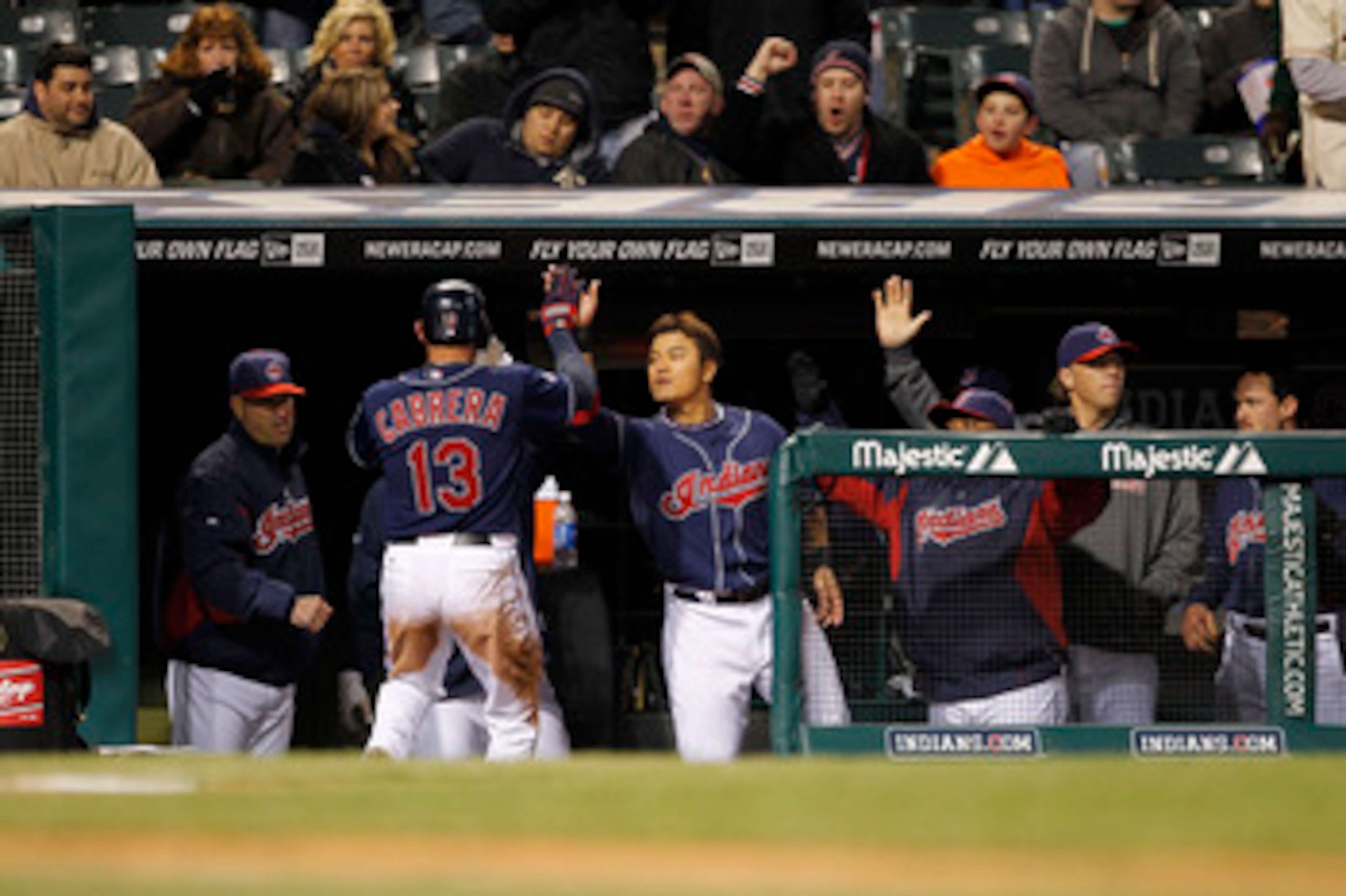 CLEVELAND - APRIL 05:  Asdrubal Cabrera #13 of the Cleveland Indians celebrates afer scoring during the fifth inning of the game against the Boston Red Sox at Progressive Field on April 5, 2011 in Cleveland, Ohio.  (Photo by Leon Halip/Getty Images)