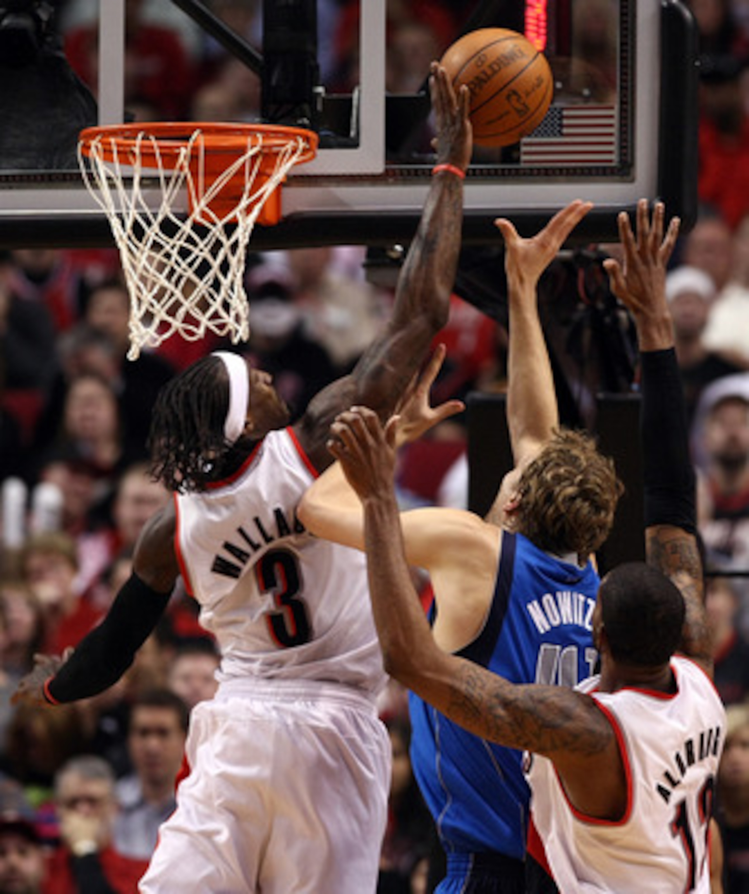 PORTLAND, OR - APRIL 21:  Gerald Wallace #3 of the Portland Trail Blazers blocks the shot of Dirk Nowitzki #41 of the Dallas Mavericks in Game Three of the Western Conference Quarterfinals in the 2011 NBA Playoffs on April 21, 2011 at the Rose Garden in P