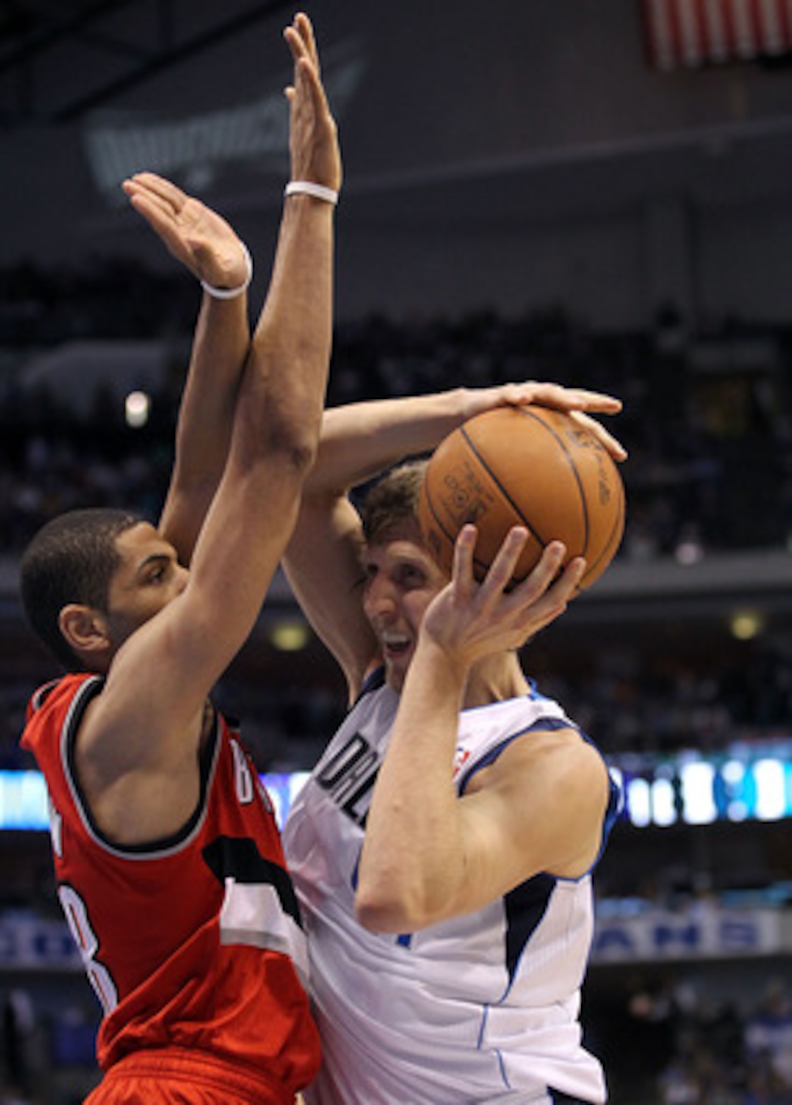 DALLAS, TX - APRIL 19:  Forward Dirk Nowitzki #41 of the Dallas Mavericks takes a shot against Nicolas Batum #88 of the Portland Trail Blazers in Game Two of the Western Conference Quarterfinals during the 2011 NBA Playoffs on April 19, 2011 at American A
