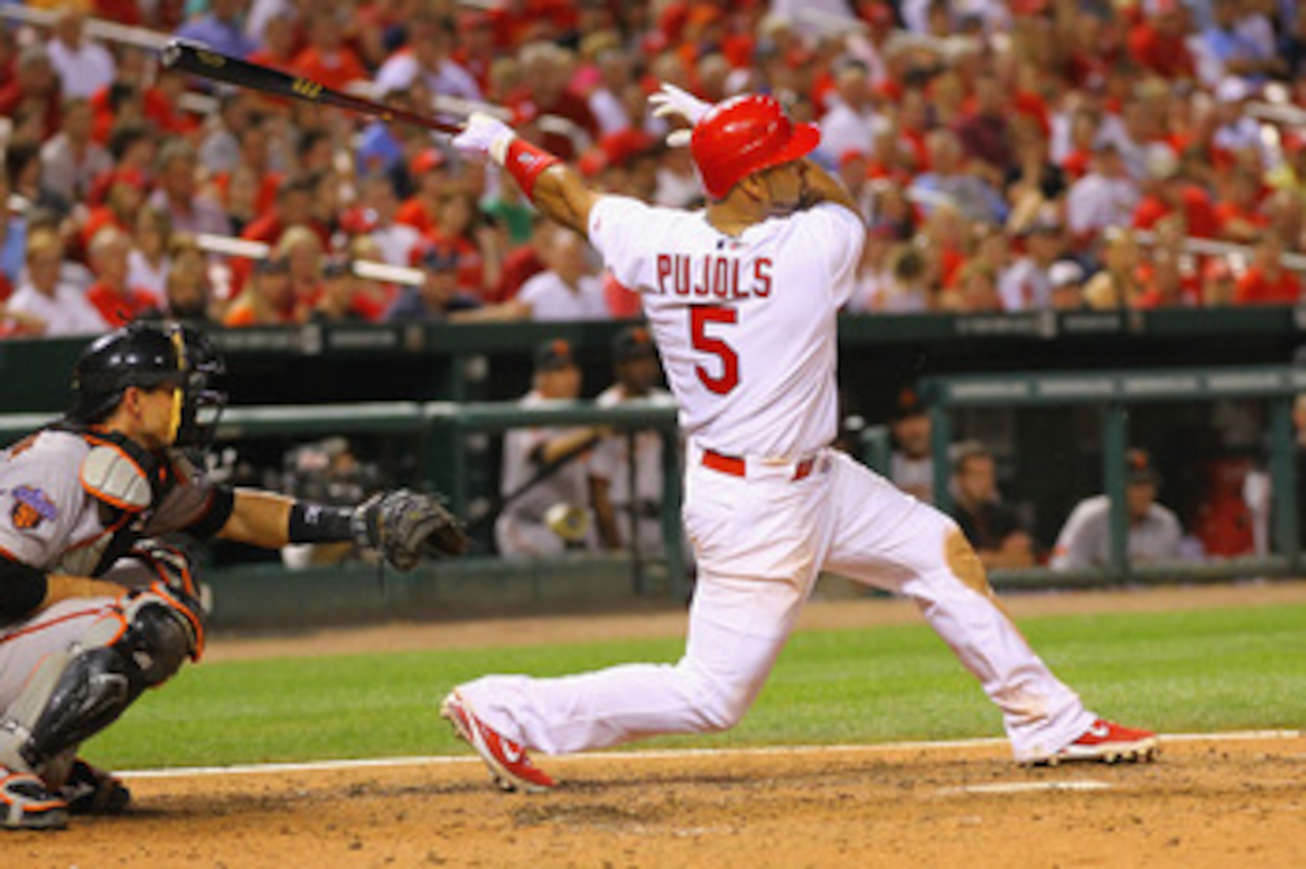 ST. LOUIS, MO - MAY 31: Albert Pujols #5 of the St. Louis Cardinals hits an RBI double against the San Francisco Giants at Busch Stadium on May 31, 2011 in St. Louis, Missouri.  (Photo by Dilip Vishwanat/Getty Images)