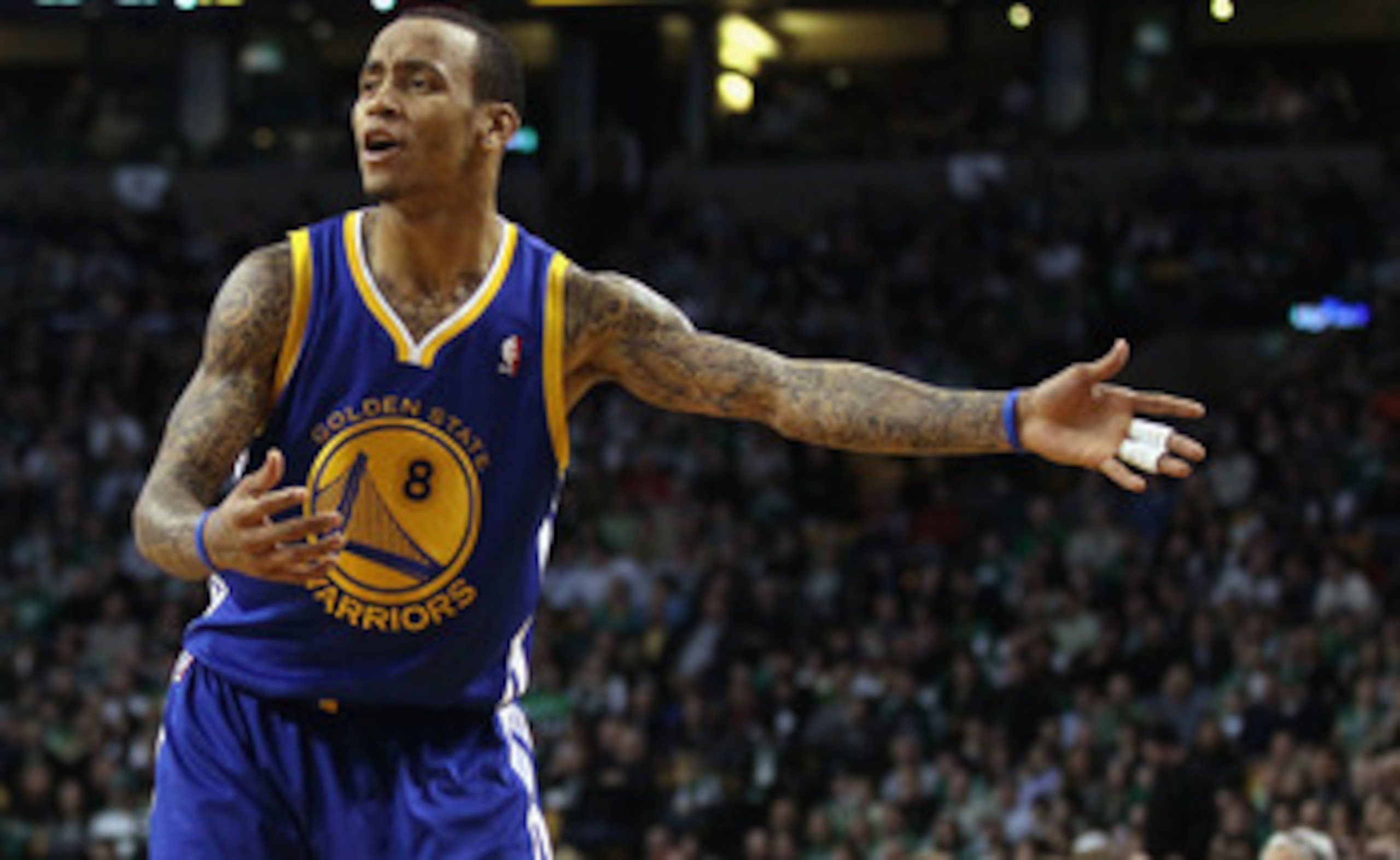 BOSTON, MA - MARCH 04:  Monta Ellis #8 of the Golden State Warriors reacts after the ball is given to the Boston Celtics on March 4, 2011 at the TD Garden in Boston, Massachusetts.  The Celtics defeated the Warriors 107-103. NOTE TO USER: User expressly a