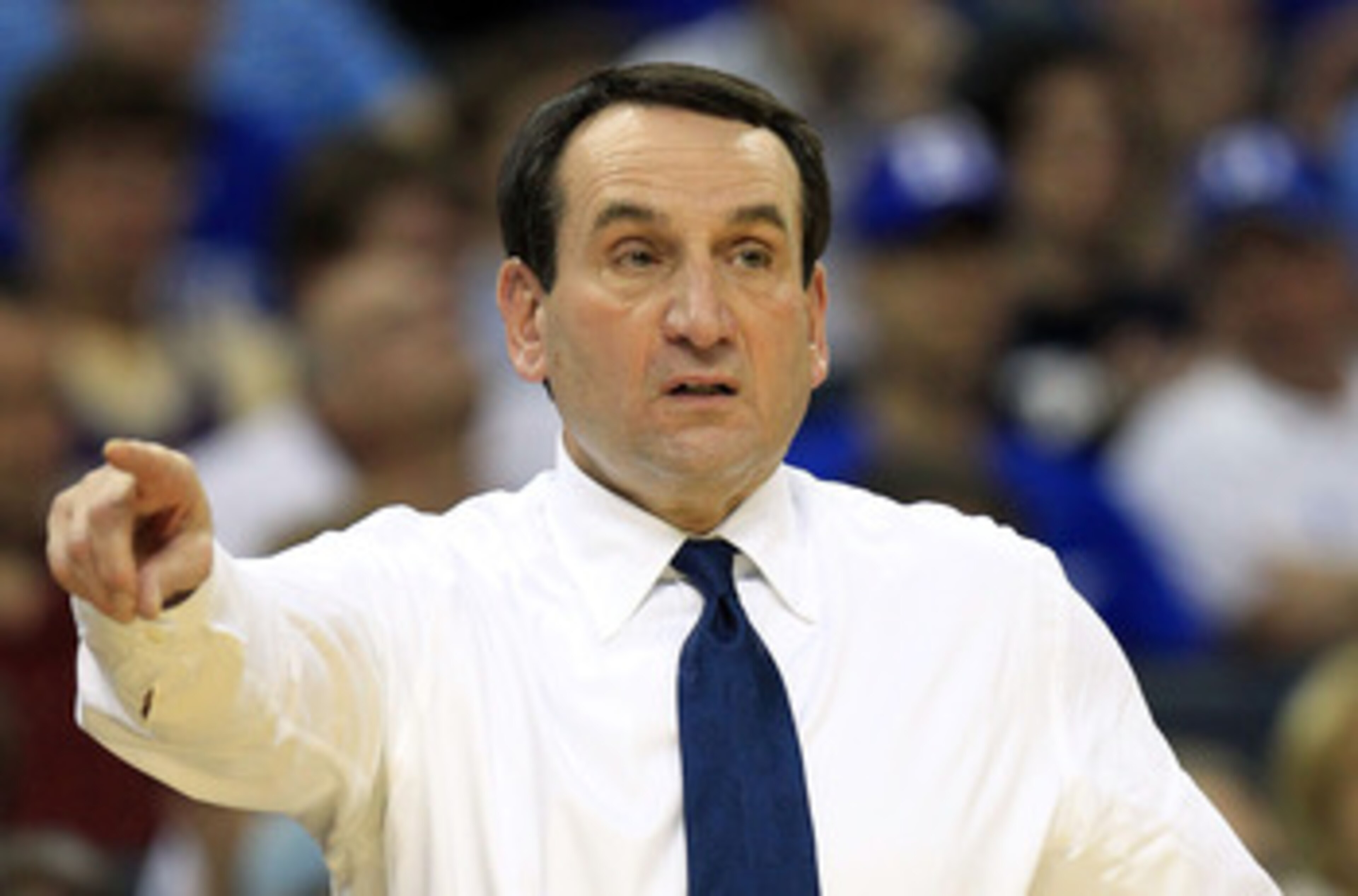 CHARLOTTE, NC - MARCH 20:  Head coach Mike Krzyzewski of the Duke Blue Devils reacts while taking on the Michigan Wolverines during the third round of the 2011 NCAA men's basketball tournament at Time Warner Cable Arena on March 20, 2011 in Charlotte, Nor