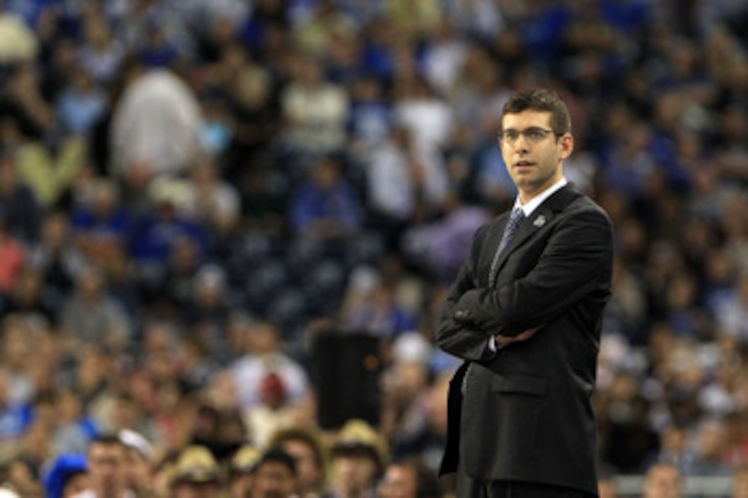 HOUSTON, TX - APRIL 04:  Head coach Brad Stevens of the Butler Bulldogs looks on from the sidelines against the Connecticut Huskies during the National Championship Game of the 2011 NCAA Division I Men's Basketball Tournament at Reliant Stadium on April 4