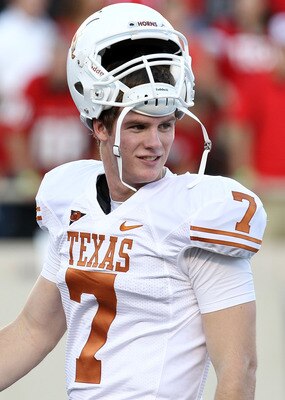 LUBBOCK, TX - SEPTEMBER 18:  Quarterback Garrett Gilbert #7 of the Texas Longhorns at Jones AT&T Stadium on September 18, 2010 in Lubbock, Texas.  (Photo by Ronald Martinez/Getty Images)