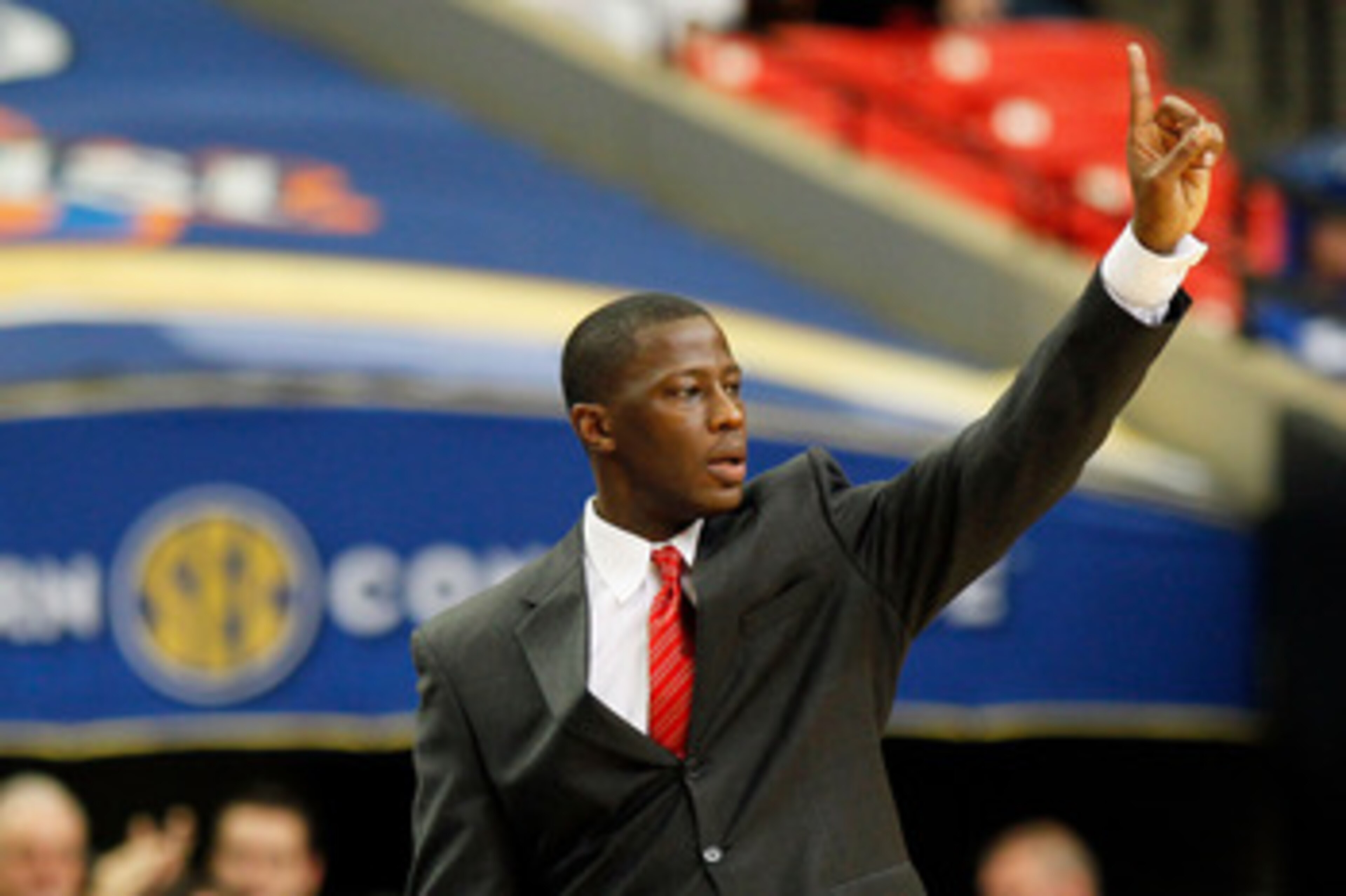 ATLANTA, GA - MARCH 12:  Head coach Anthony Grant of the Alabama Crimson Tide coaches against the Kentucky Wildcats during the semifinals of the SEC Men's Basketball Tournament at Georgia Dome on March 12, 2011 in Atlanta, Georgia.  (Photo by Kevin C. Cox