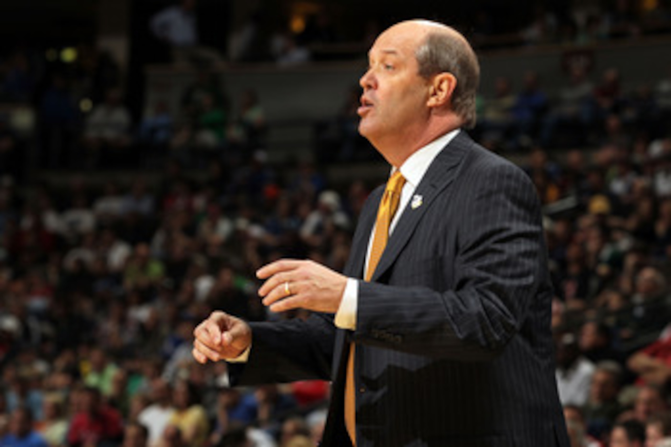 DENVER, CO - MARCH 17:  Head coach Kevin Stallings of the Vanderbilt Commodores shouts from the bench against the Richmond Spiders during the second round of the 2011 NCAA men's basketball tournament at Pepsi Center on March 17, 2011 in Denver, Colorado. 