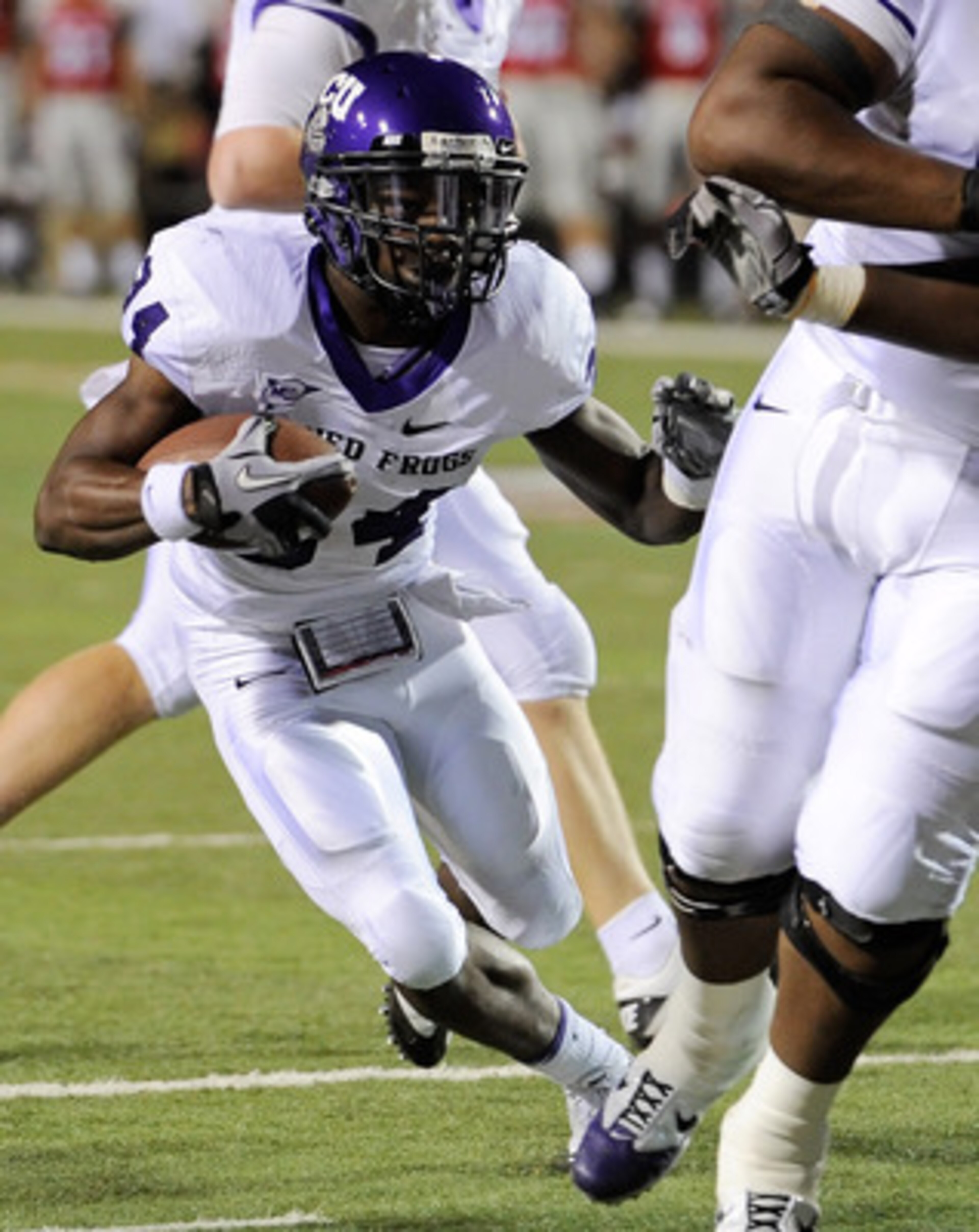 LAS VEGAS - OCTOBER 30:  Ed Wesley #34 of the Texas Christian University Horned Frogs runs for yardage against the UNLV Rebels during their game at Sam Boyd Stadium October 30, 2010 in Las Vegas, Nevada. TCU won 48-6.  (Photo by Ethan Miller/Getty Images)