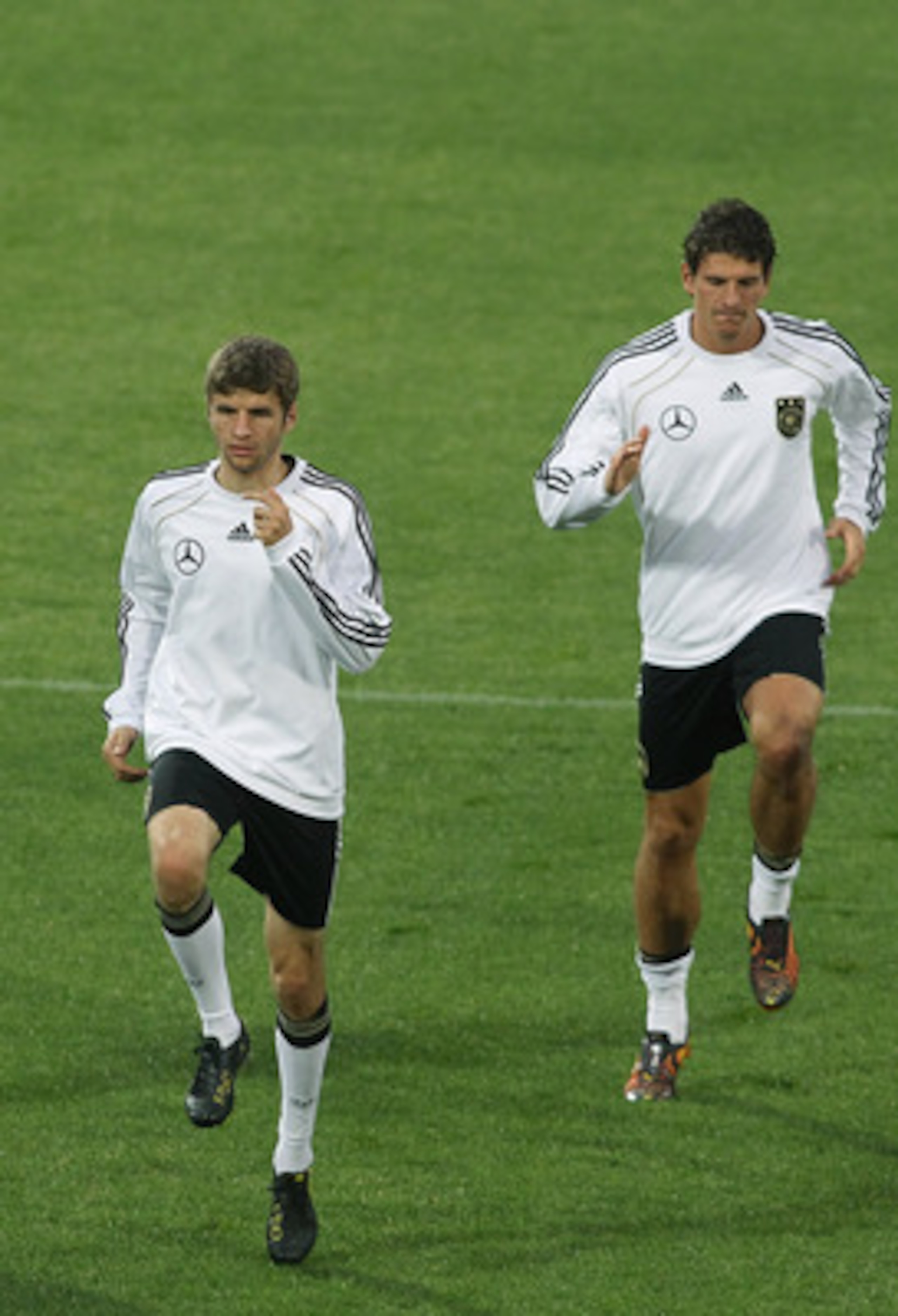 PRETORIA, SOUTH AFRICA - JULY 05:  Players of Germany exercise during a training session at Super stadium on July 5, 2010 in Pretoria, South Africa.  (Photo by Joern Pollex/Getty Images)
