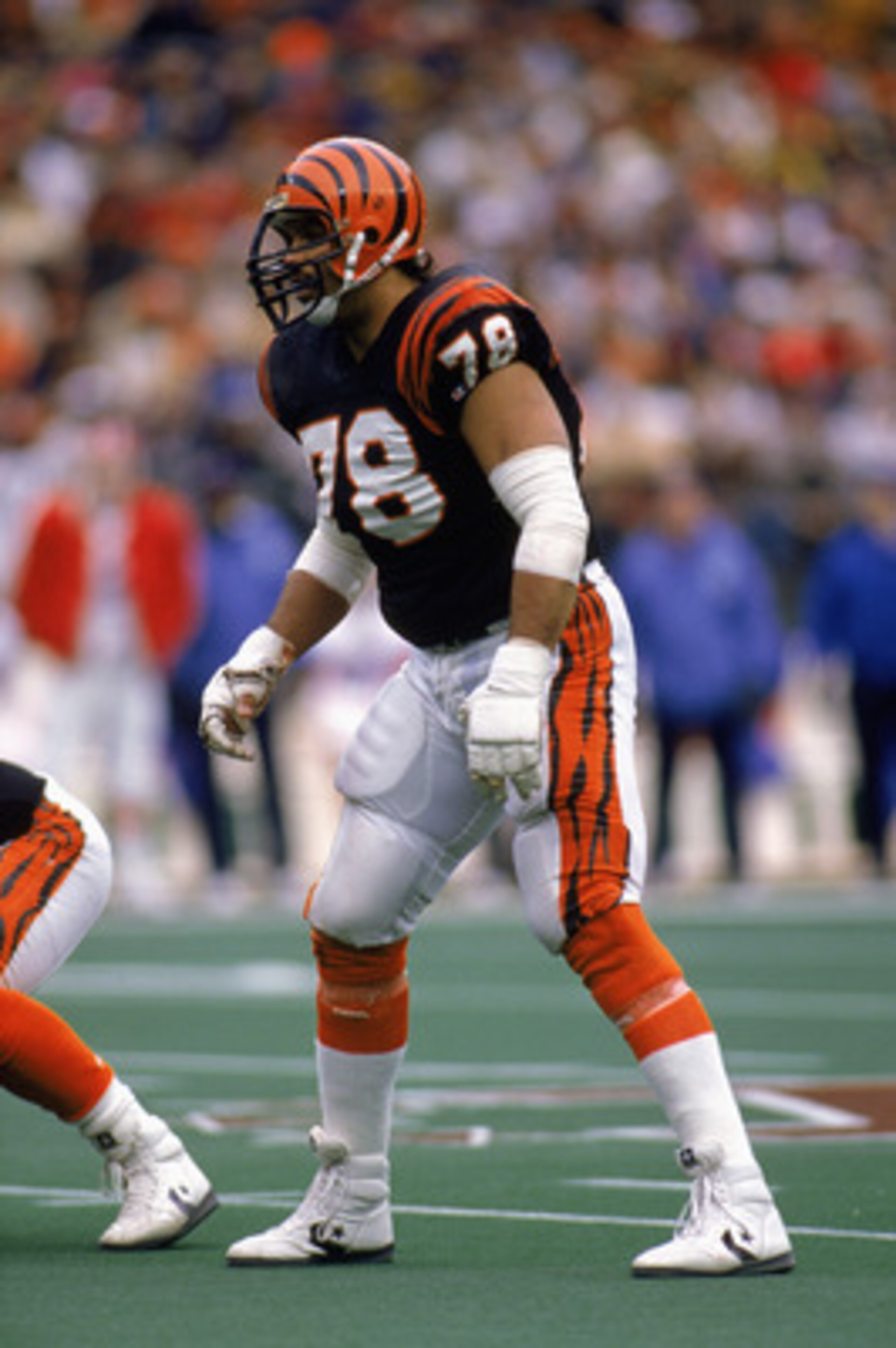 BUFFALO, NY - JANUARY 8: Anthony Munoz #78 of the Cincinnati Bengals gets ready for the snap during the AFC Championship game against the Buffalo Bills at Rich Stadium on January 8, 1989 in Buffalo, New York. The Bengals defeated the Bills 21-10. (Photo BUFFALO, NY - JANUARY 8: Anthony Munoz #78 of the Cincinnati Bengals gets ready for the snap during the AFC Championship game against the Buffalo Bills at Rich Stadium on January 8, 1989 in Buffalo, New York. The Bengals defeated the Bills 21-10. (Photo