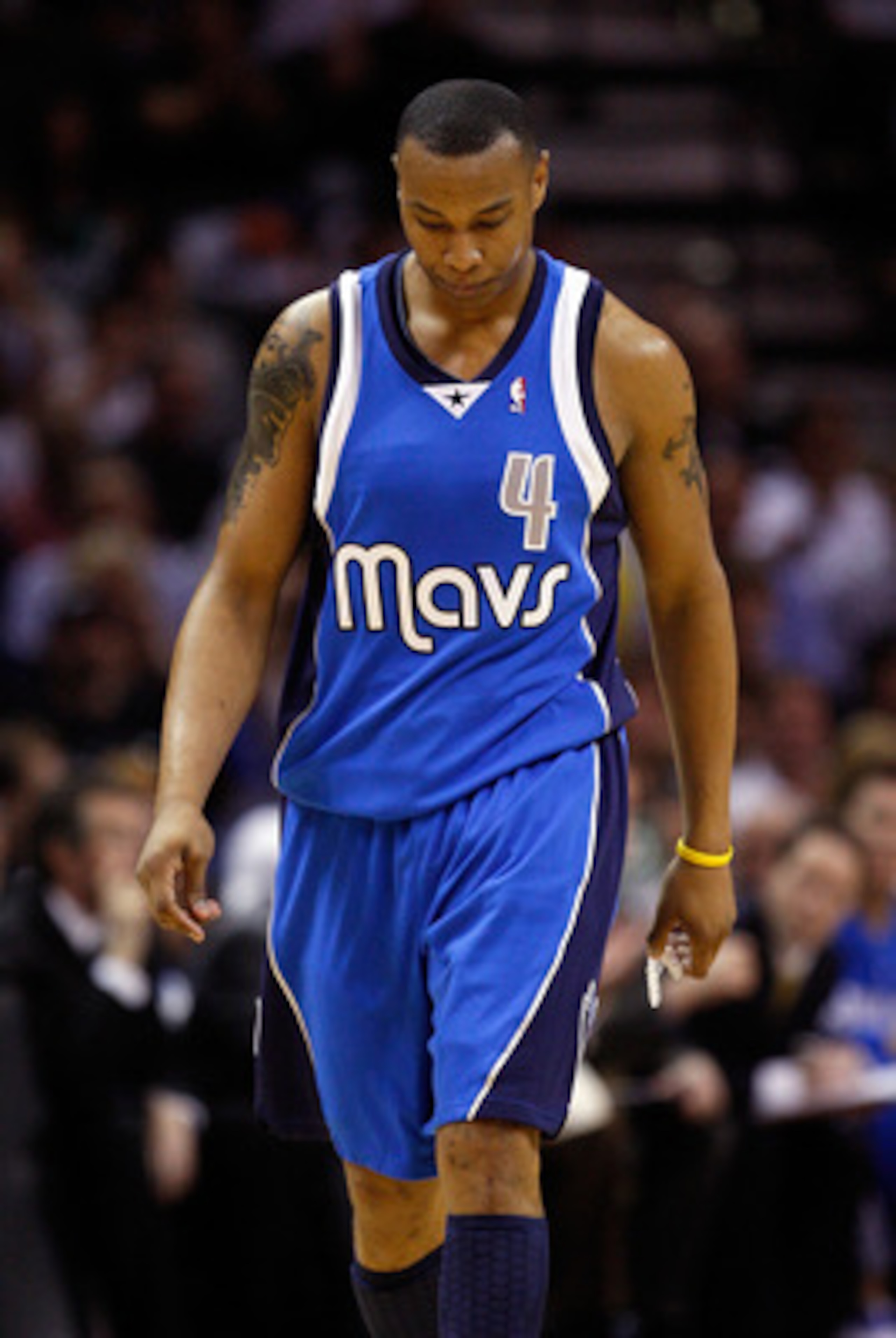 SAN ANTONIO - APRIL 23:  Forward Caron Butler #4 of the Dallas Mavericks walks off the court during play against the San Antonio Spurs in Game Three of the Western Conference Quarterfinals during the 2010 NBA Playoffs at AT&T Center on April 23, 2010 in S