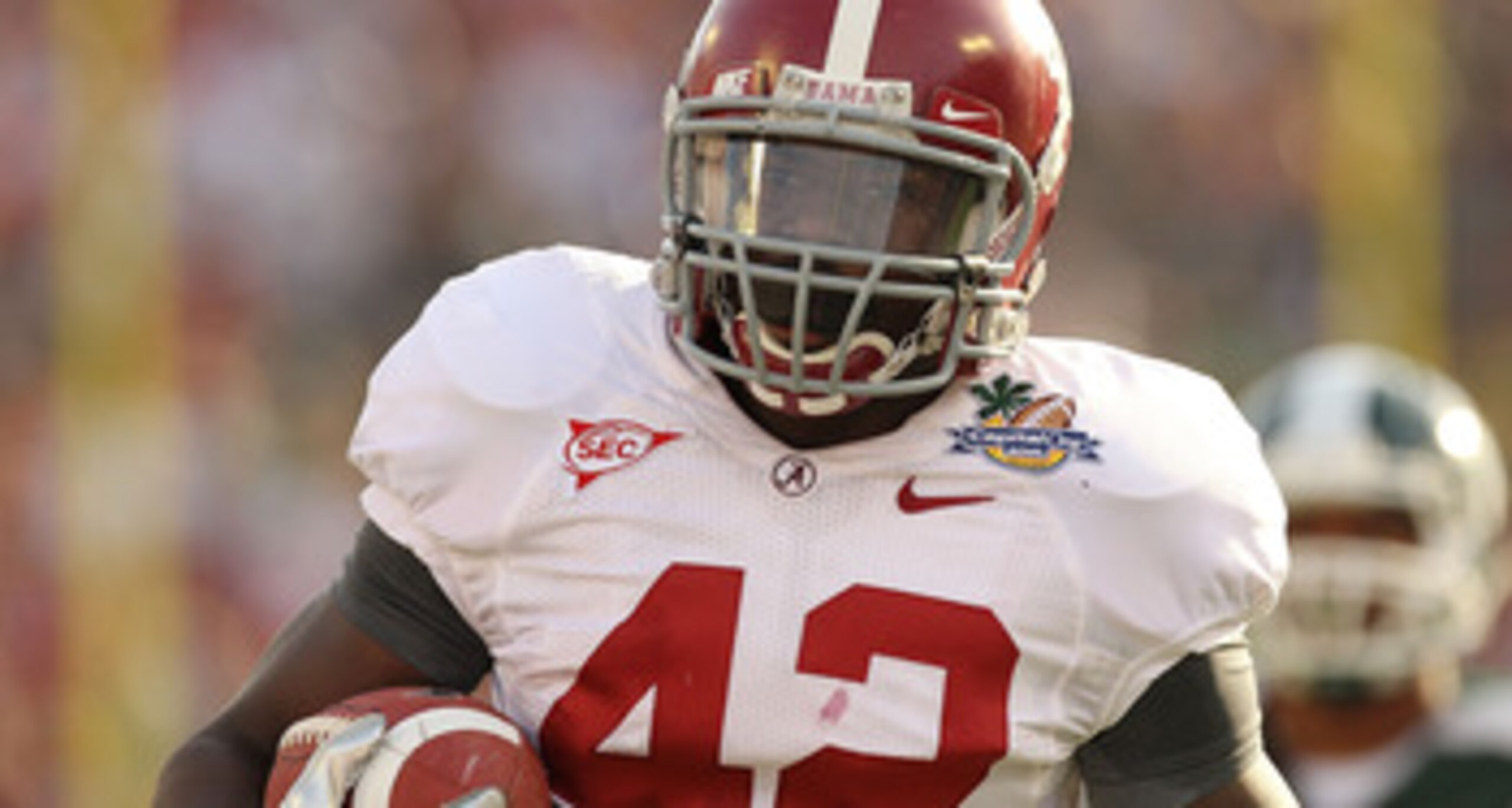 ORLANDO, FL - JANUARY 01: Eddie Lacy #42 of the Alabama Crimson Tide rushes for a touchdown during the Capitol One Bowl against the Michigan State Spartans at the Florida Citrus Bowl on January 1, 2011 in Orlando, Florida. (Photo by Mike Ehrmann/Getty I ORLANDO, FL - JANUARY 01: Eddie Lacy #42 of the Alabama Crimson Tide rushes for a touchdown during the Capitol One Bowl against the Michigan State Spartans at the Florida Citrus Bowl on January 1, 2011 in Orlando, Florida. (Photo by Mike Ehrmann/Getty I