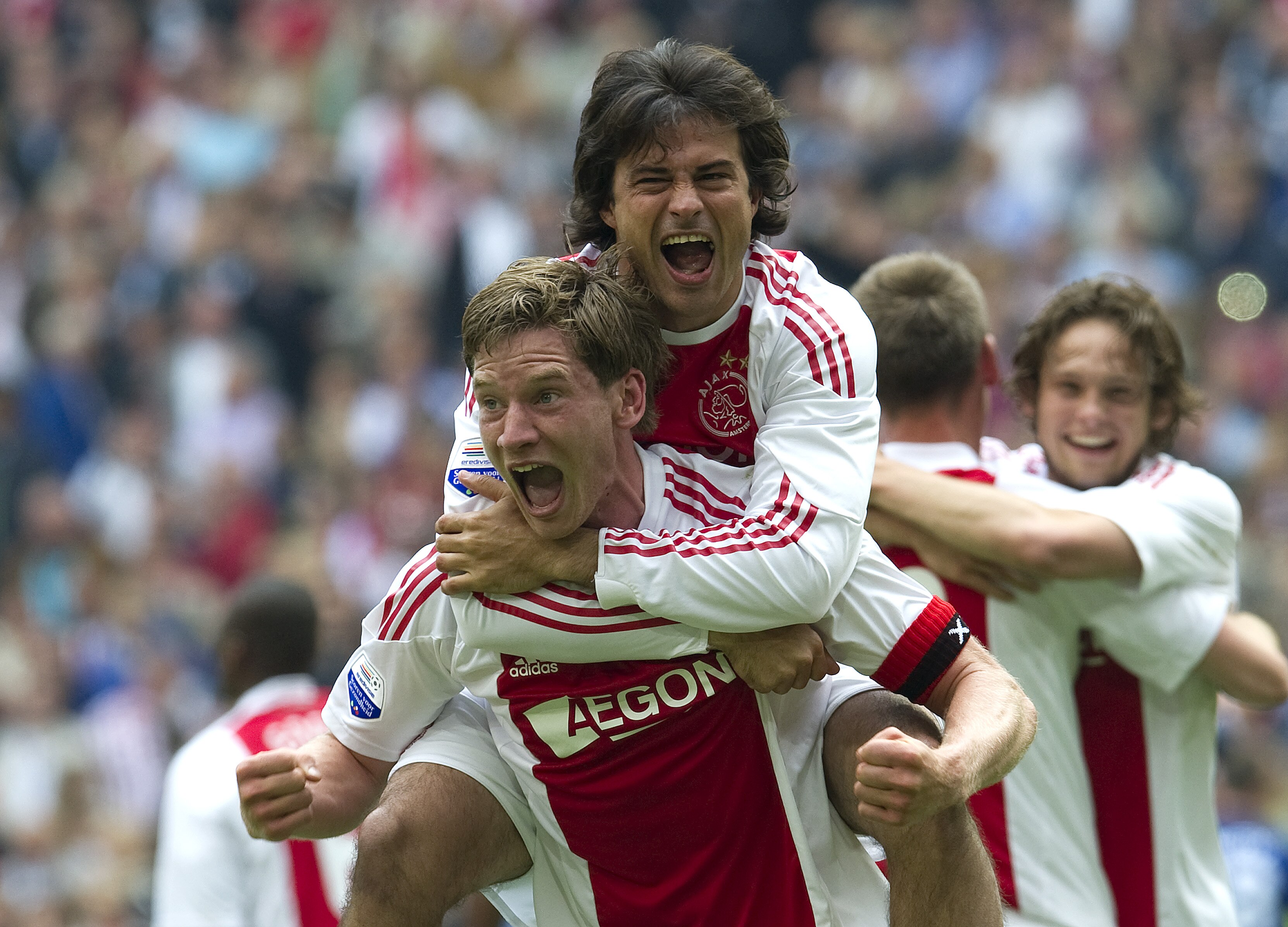 AMSTERDAM, THE NETHERLANDS - MAY 15: Jan Vertonghen and Dario Cvitanich of Ajax Amsterdam celebrates during the Eridivisie match between Ajax Amsterdam and FC Twente at the Amsterdam Arena on May 15, 2010 in Amsterdam, The Netherlands. (Photo by Toussai AMSTERDAM, THE NETHERLANDS - MAY 15: Jan Vertonghen and Dario Cvitanich of Ajax Amsterdam celebrates during the Eridivisie match between Ajax Amsterdam and FC Twente at the Amsterdam Arena on May 15, 2010 in Amsterdam, The Netherlands. (Photo by Toussai