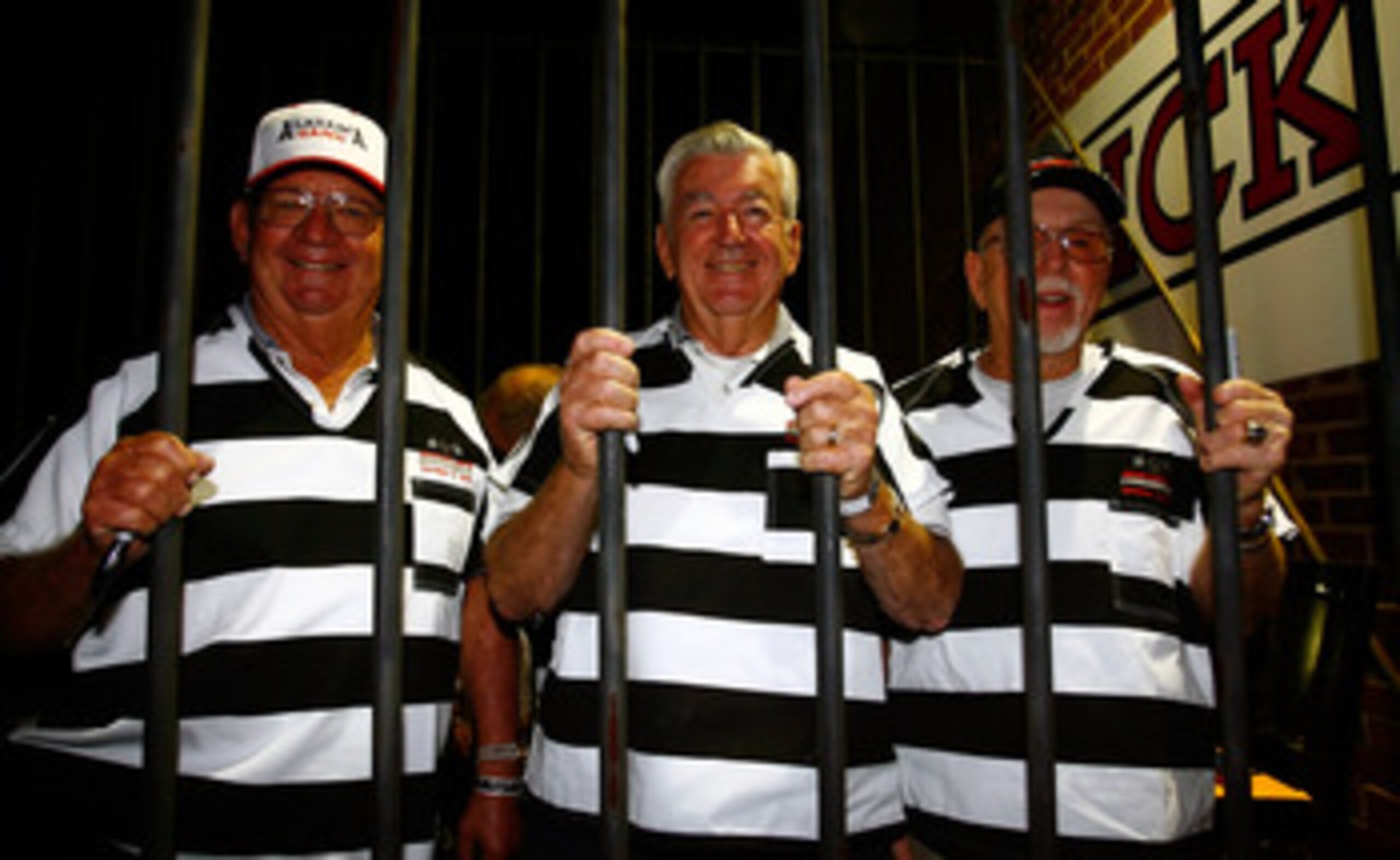DAVIDSON, NC - OCTOBER 12: Former NASCAR drivers known as the 'Alabama Gang' (L-R) Donnie Allison, Bobby Allison, and Red Farmer, sit inside a jail cell to raise money during the NASCAR third annual Jail & Bail held at Brickhouse Tavern on October 12, 20 DAVIDSON, NC - OCTOBER 12: Former NASCAR drivers known as the 'Alabama Gang' (L-R) Donnie Allison, Bobby Allison, and Red Farmer, sit inside a jail cell to raise money during the NASCAR third annual Jail & Bail held at Brickhouse Tavern on October 12, 20