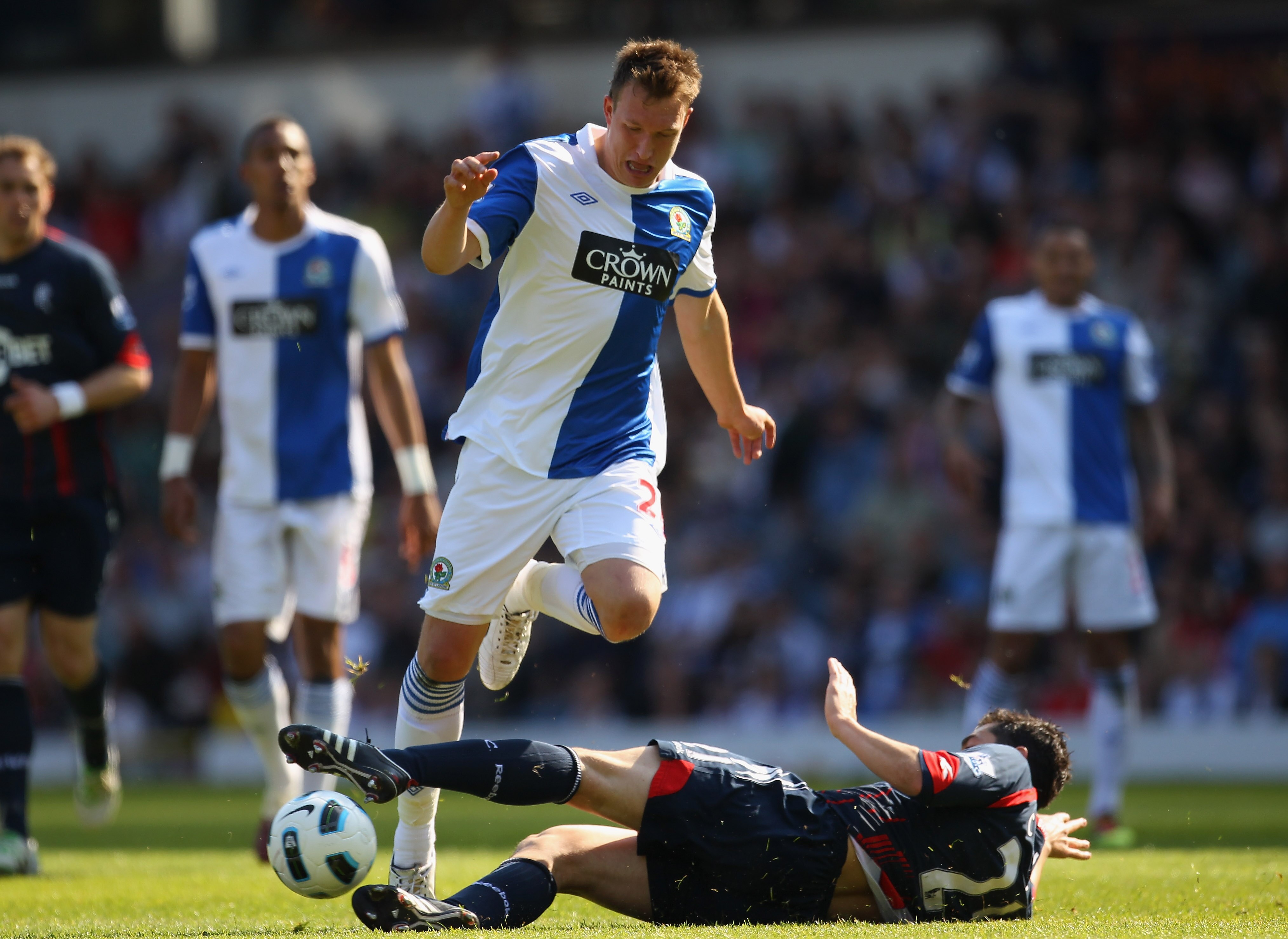 BLACKBURN, ENGLAND - APRIL 30: Phil Jones of Blackburn Rovers is tackled by Tamir Cohen of Bolton Wanderers during the Barclays Premier League match between Blackburn Rovers and Bolton Wanderers at Ewood Park on April 30, 2011 in Blackburn, England. (Ph BLACKBURN, ENGLAND - APRIL 30: Phil Jones of Blackburn Rovers is tackled by Tamir Cohen of Bolton Wanderers during the Barclays Premier League match between Blackburn Rovers and Bolton Wanderers at Ewood Park on April 30, 2011 in Blackburn, England. (Ph