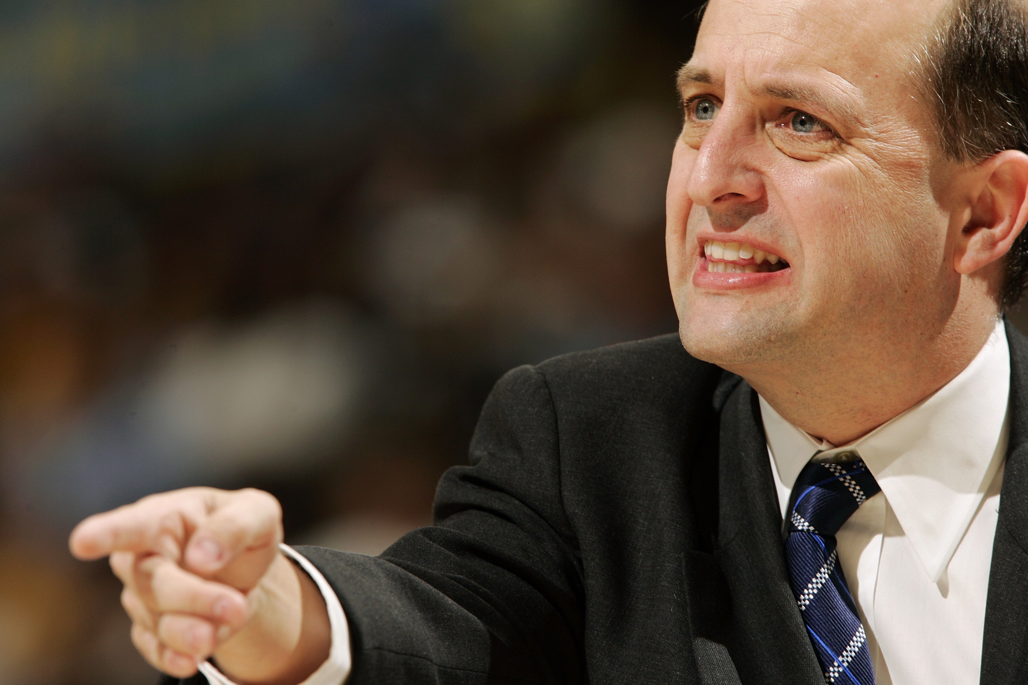 DENVER - APRIL 17: Head coach Jeff Van Gundy of the Houston Rockets exhorts his players to give a full effort against the Denver Nuggets on April 17, 2006 at the Pepsi Center in Denver, Colorado. The Rockets won 86-83 in the final seconds. NOTE TO USER: DENVER - APRIL 17: Head coach Jeff Van Gundy of the Houston Rockets exhorts his players to give a full effort against the Denver Nuggets on April 17, 2006 at the Pepsi Center in Denver, Colorado. The Rockets won 86-83 in the final seconds. NOTE TO USER: