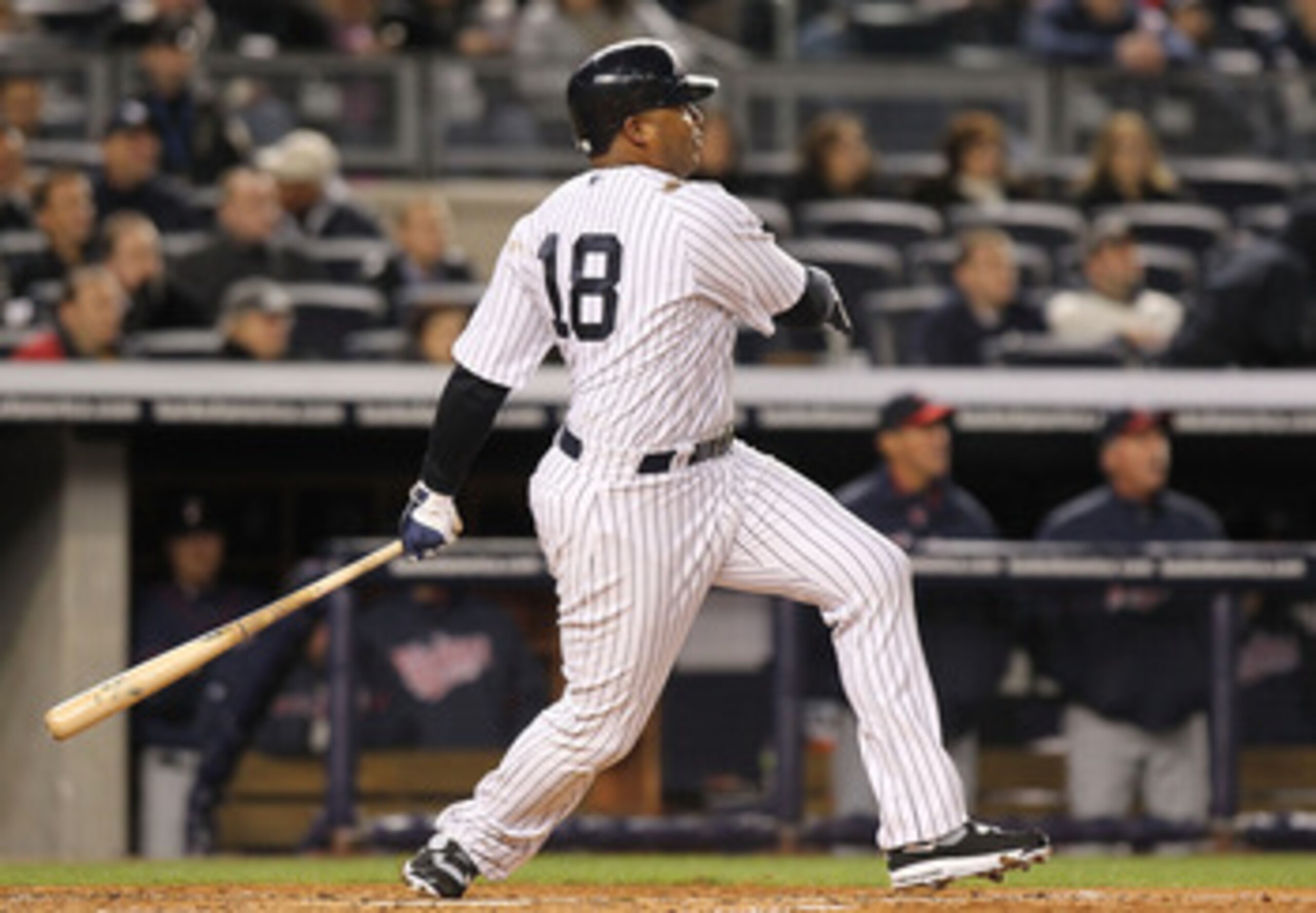 NEW YORK, NY - APRIL 05:  Andruw Jones #18 of the New York Yankees hits a solo homerun against the Minnesota Twins at Yankee Stadium on April 5, 2011 in the Bronx borough of New York City.  (Photo by Nick Laham/Getty Images)