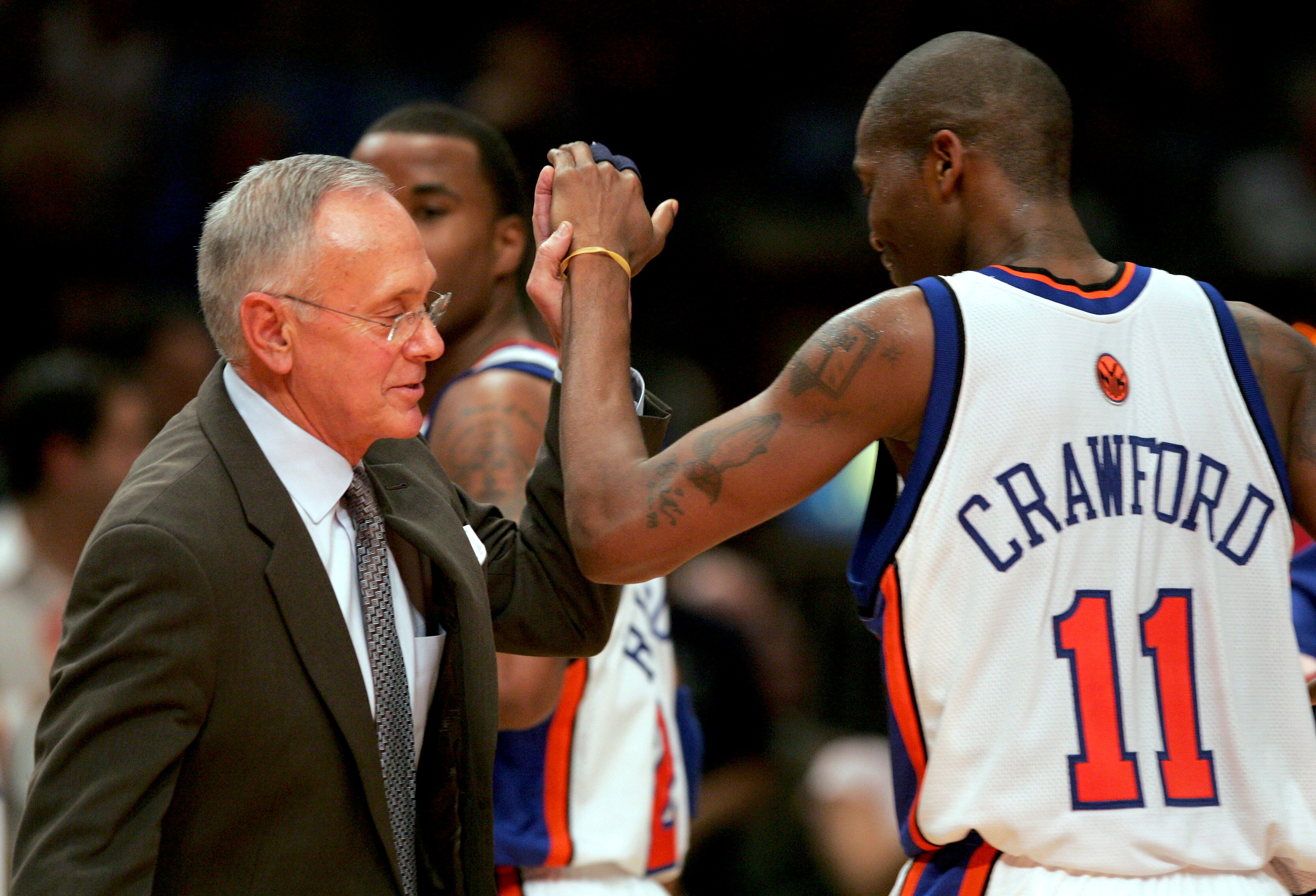 NEW YORK - DECEMBER 23: New York Knicks head coach Larry Brown high fives Jamal Crawford, the Knicks high scorer, during their 98-90 win over the Utah Jazz on December 23, 2005 at Madison Square Garden in New York City. The Knicks won 98-90. NOTE TO USER NEW YORK - DECEMBER 23: New York Knicks head coach Larry Brown high fives Jamal Crawford, the Knicks high scorer, during their 98-90 win over the Utah Jazz on December 23, 2005 at Madison Square Garden in New York City. The Knicks won 98-90. NOTE TO USER