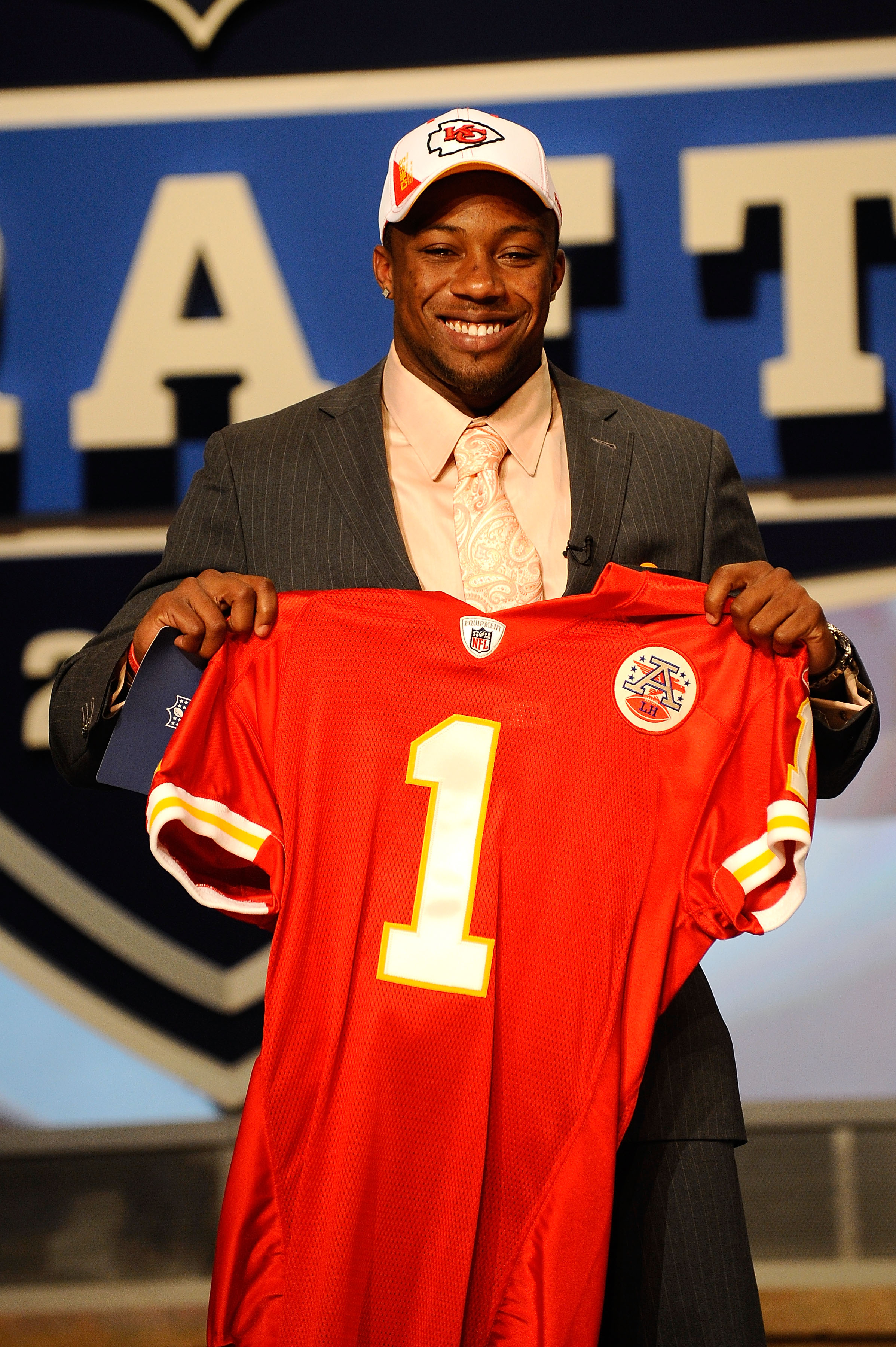 NEW YORK - APRIL 22:  Eric Berry from the Tennessee Volunteers holds a Kansas City Chiefs jersey after the Chiefs selected Berry #5 overall in the first round of the 2010 NFL Draft at Radio City Music Hall on April 22, 2010 in New York City.  (Photo by Je