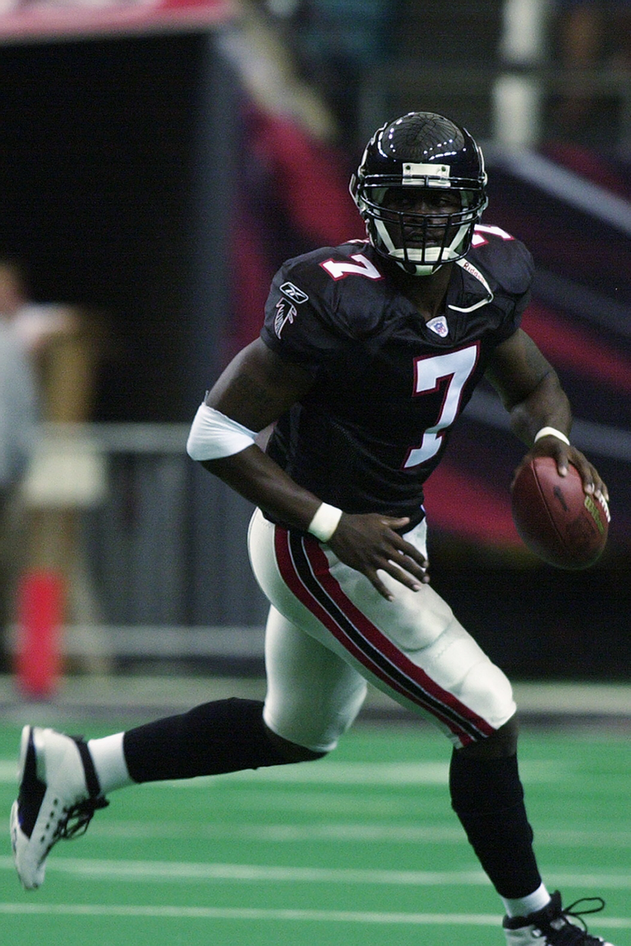 ATLANTA - OCTOBER 6: Atlanta Falcons quarterback Michael Vick #7 looks for a receiver against the Tampa Bay Buccaneers in the first half on October 6, 2002 at the Georgia Dome in Atlanta, Georgia. The Buccaneers defeated the Falcon 20-6. (Photo by Erik S.