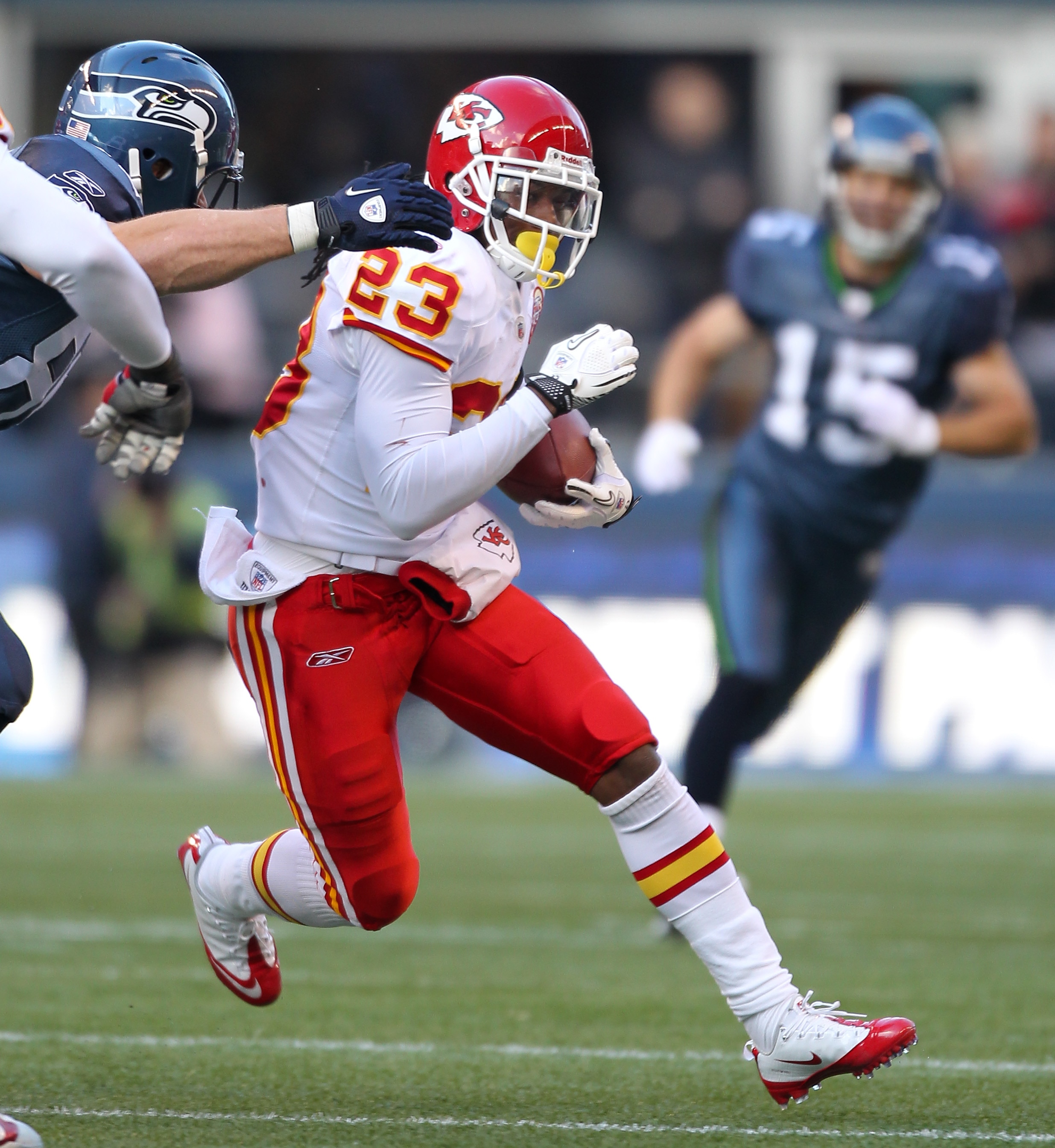 SEATTLE, WA - NOVEMBER 28:  Safety Kendrick Lewis #23 of the Kansas City Chiefs returns an interception against John Carlson #89 of the Seattle Seahawks at Qwest Field on November 28, 2010 in Seattle, Washington. The Chiefs defeated the Seahawks 42-24. (P