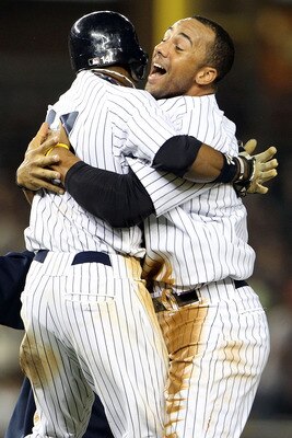 NEW YORK, NY - MAY 24:  Brett Gardner #11 and Chris Dickerson #27 of the New York Yankees celebrate after defeating the Toronto Blue Jays at Yankee Stadium on May 24, 2011 in the Bronx borough of New York City.  (Photo by Michael Heiman/Getty Images)
